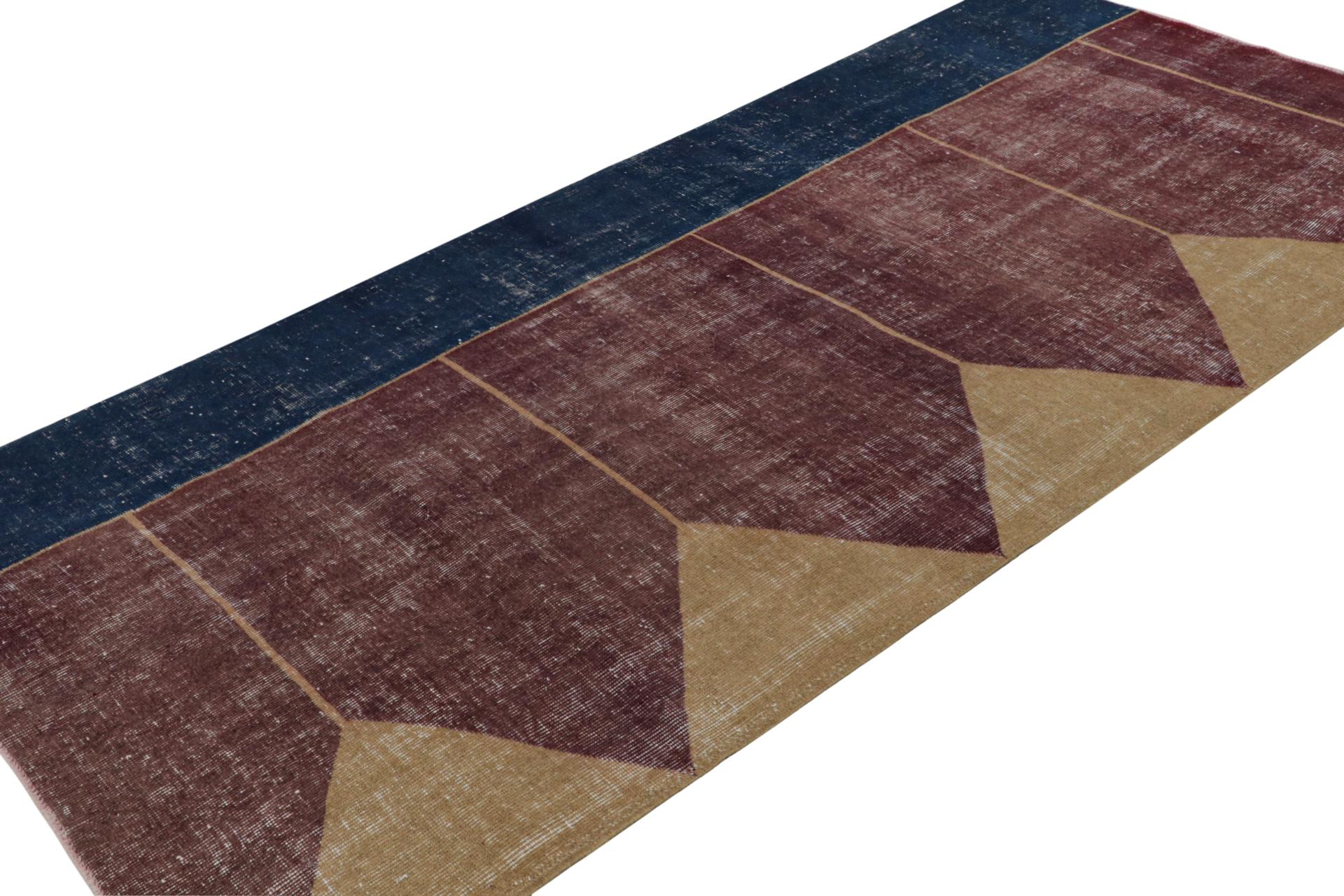 Hand Knotted in wool, this distressed vintage 4x9 Turkish rug, which is inspired by Saf rugs, a particular kind of prayer rug, features a copper brown field and geometric patterns in hues of bronze and navy blue.  

On the Design: 

Connoisseurs