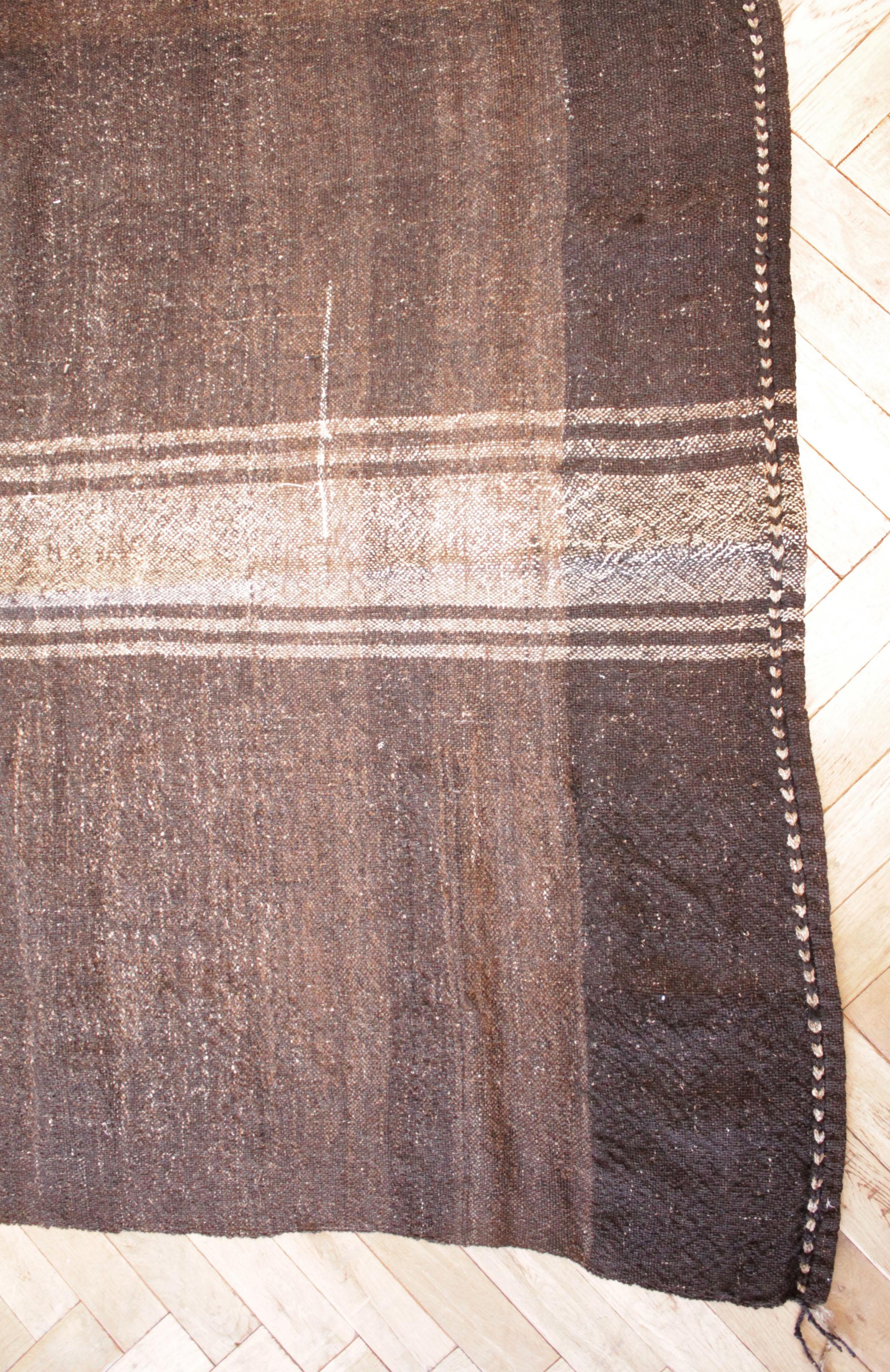 The Bradley rug
Vintage Turkish rug in brown with light natural stripes.
Our latest collection has arrived from Turkey, these are great to use as a rug, or let us create a custom ottoman for your out of this piece. If you love this stripe and