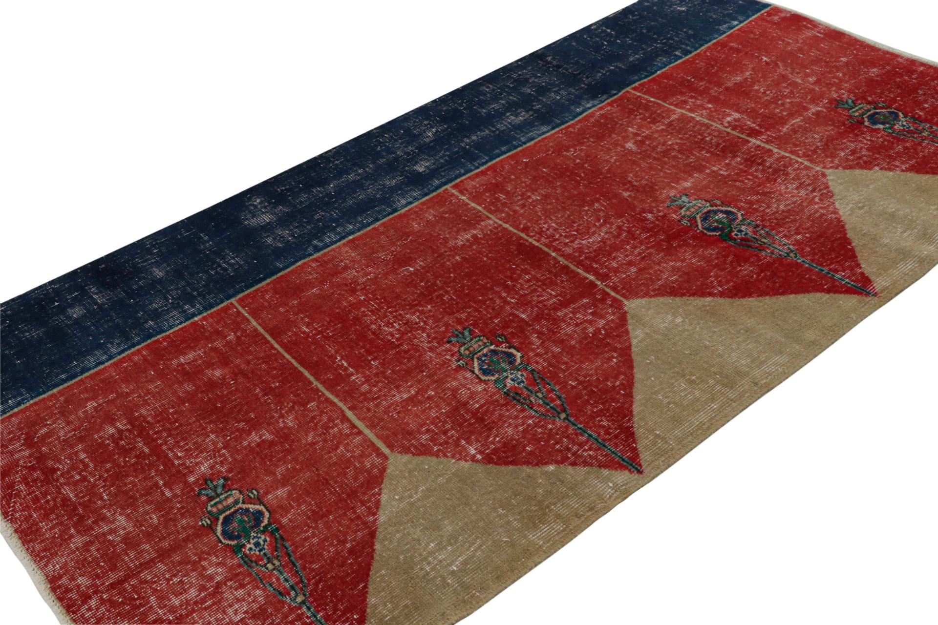 Hand Knotted in wool, this distressed vintage 4x8 Turkish rug, which is inspired by Saf rugs, a particular kind of prayer rug, features a red field and geometric patterns in hues of bronze and navy blue.  

On the Design: 

Connoisseurs will admire