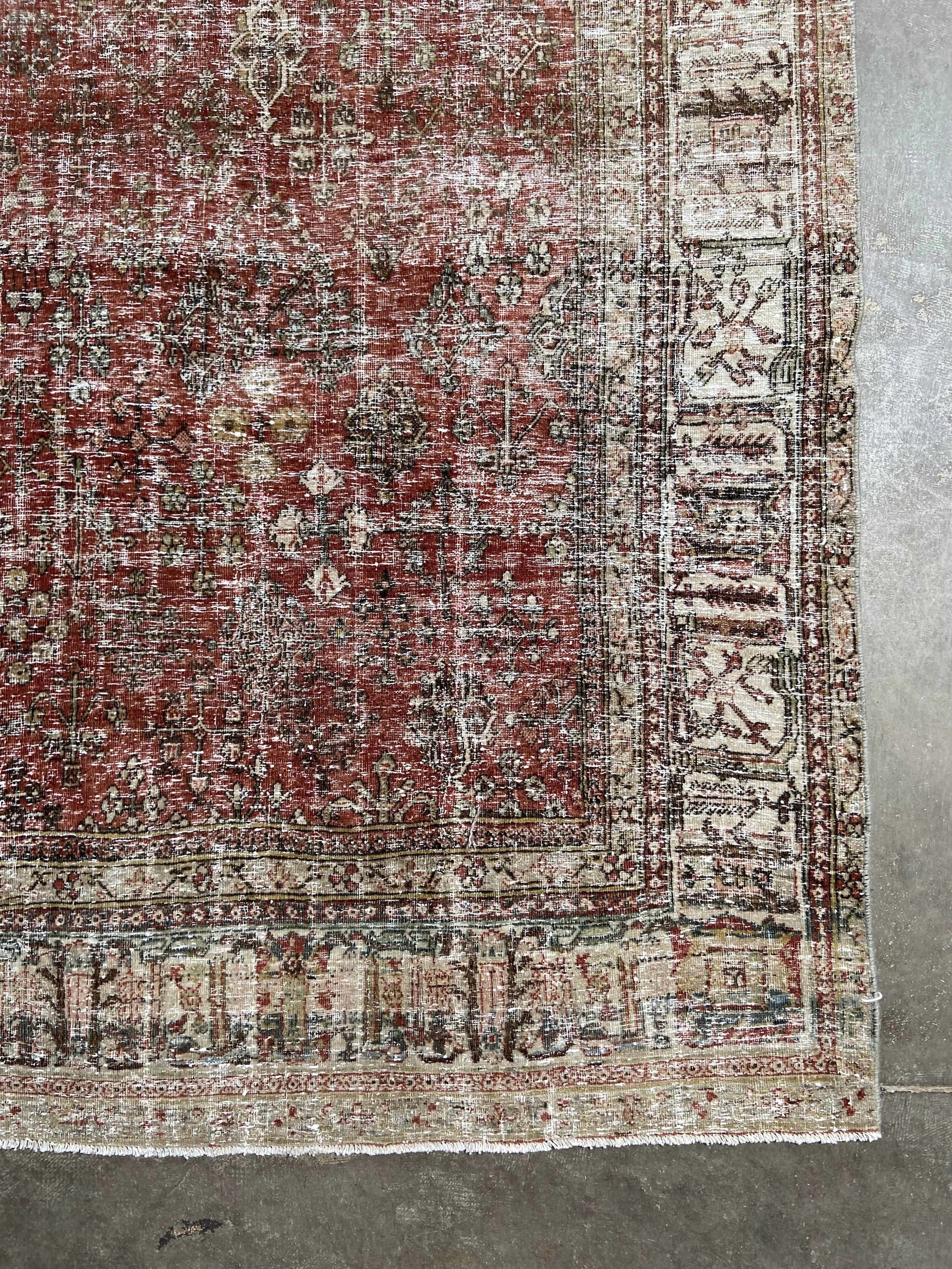 Vintage Turkish Tabriz rug 
Size: 10’ 6” x 7’ 
A beautiful and mesmerizing vintage Tabriz rug with a geometric pattern center, with amidst a tightly woven field of geometric shapes and patterns with flowers and surrounded by a wide border with