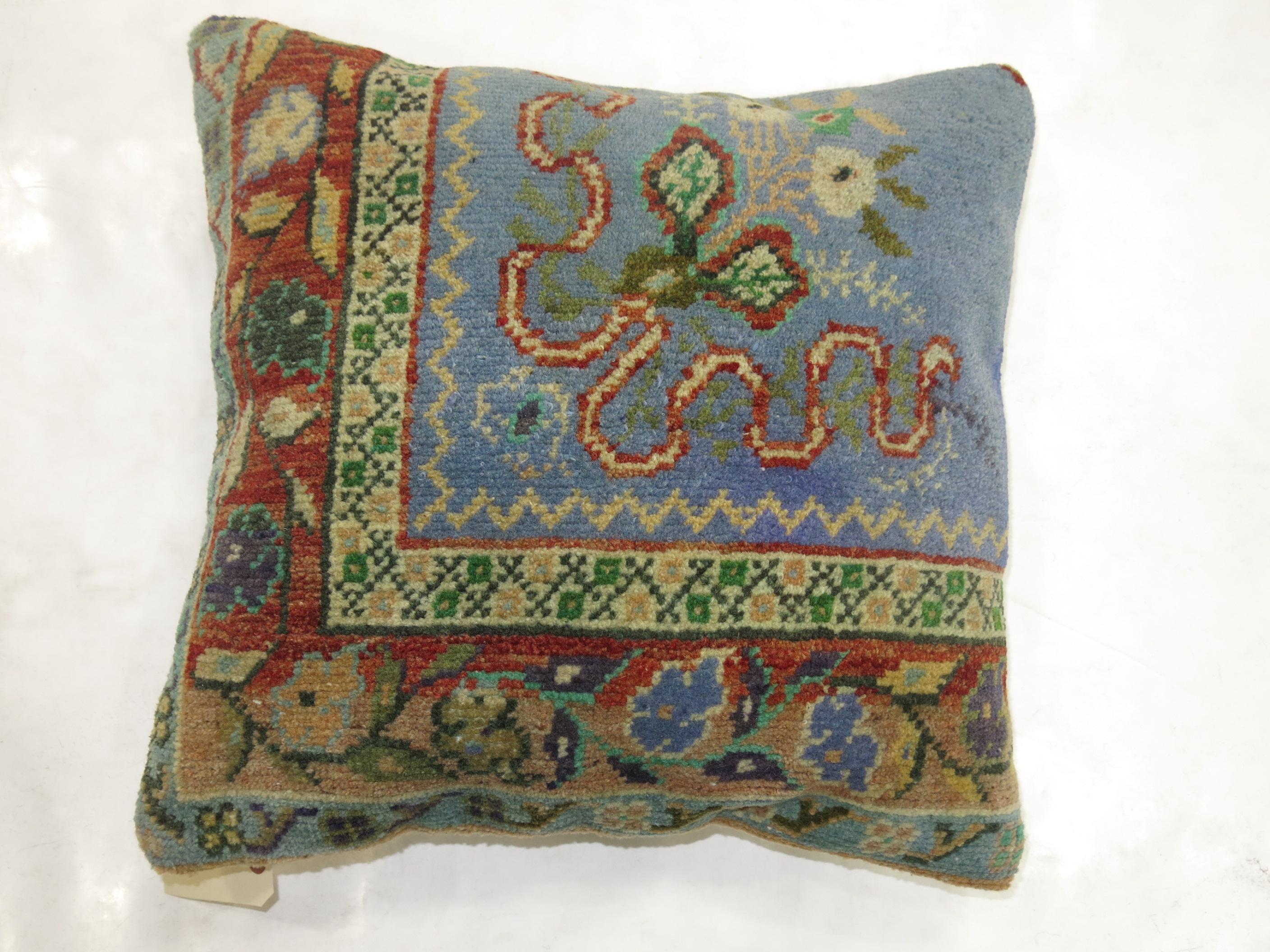 Pillow made from a blue vintage Turkish rug.

Measures: 17'' x 18''.