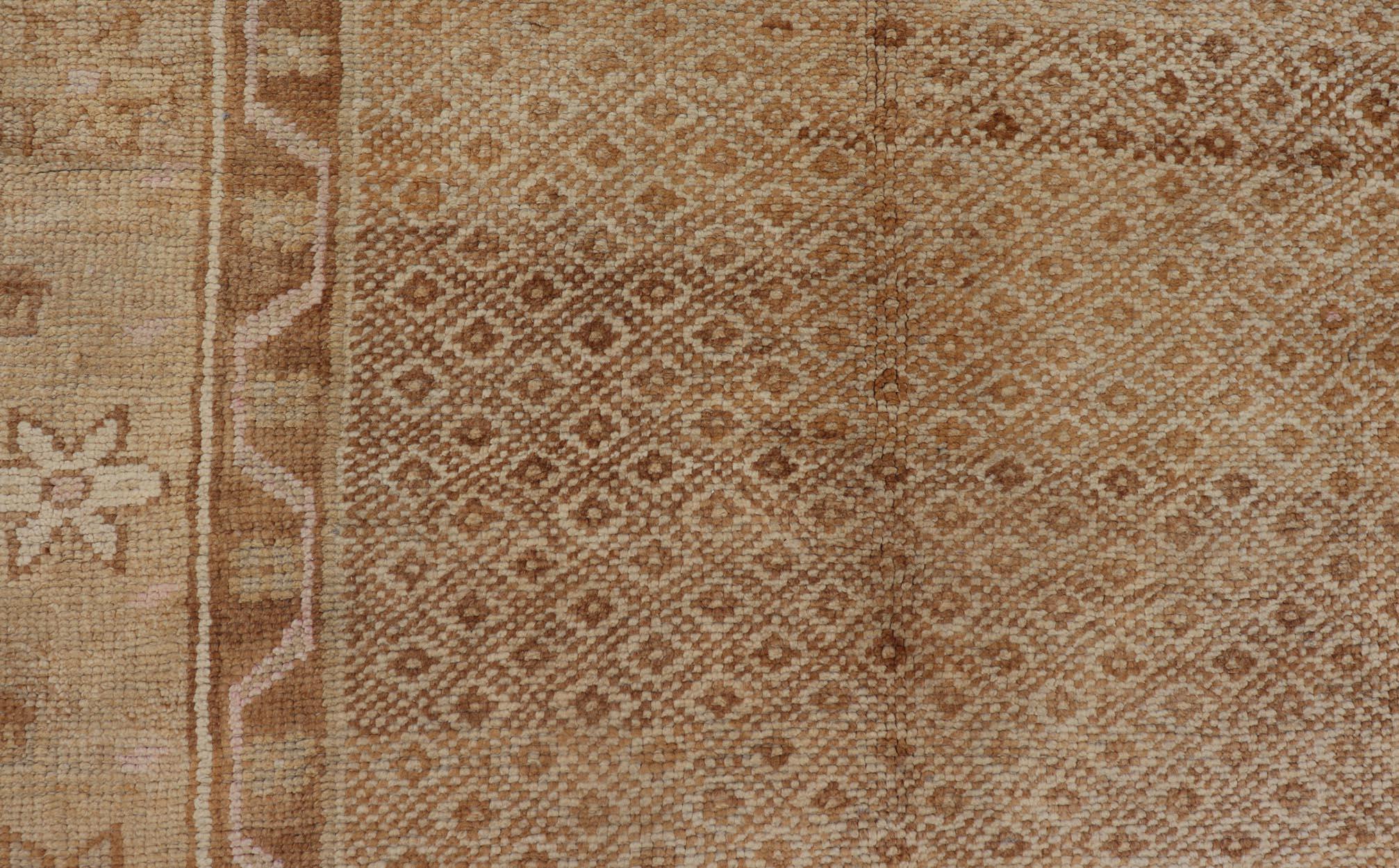 Vintage Turkish Rug with All-Over Diamond Design and Floral Border in Neutrals In Excellent Condition For Sale In Atlanta, GA