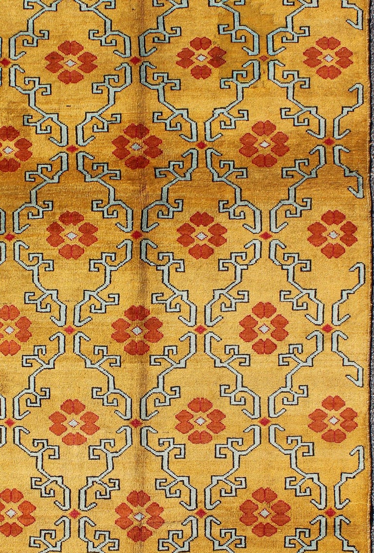 Measures: 5' x 10'11

Vintage Turkish Rug with Modern Design in bright yellow, Tangerine and L. blue
This unique and modern Design Turkish vintage Rug is characteristic of mid-century design, featuring a bright yellow background set within an