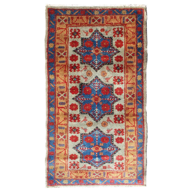 Vintage Turkish Rug with Star Design in light Green, Orange, Red and
