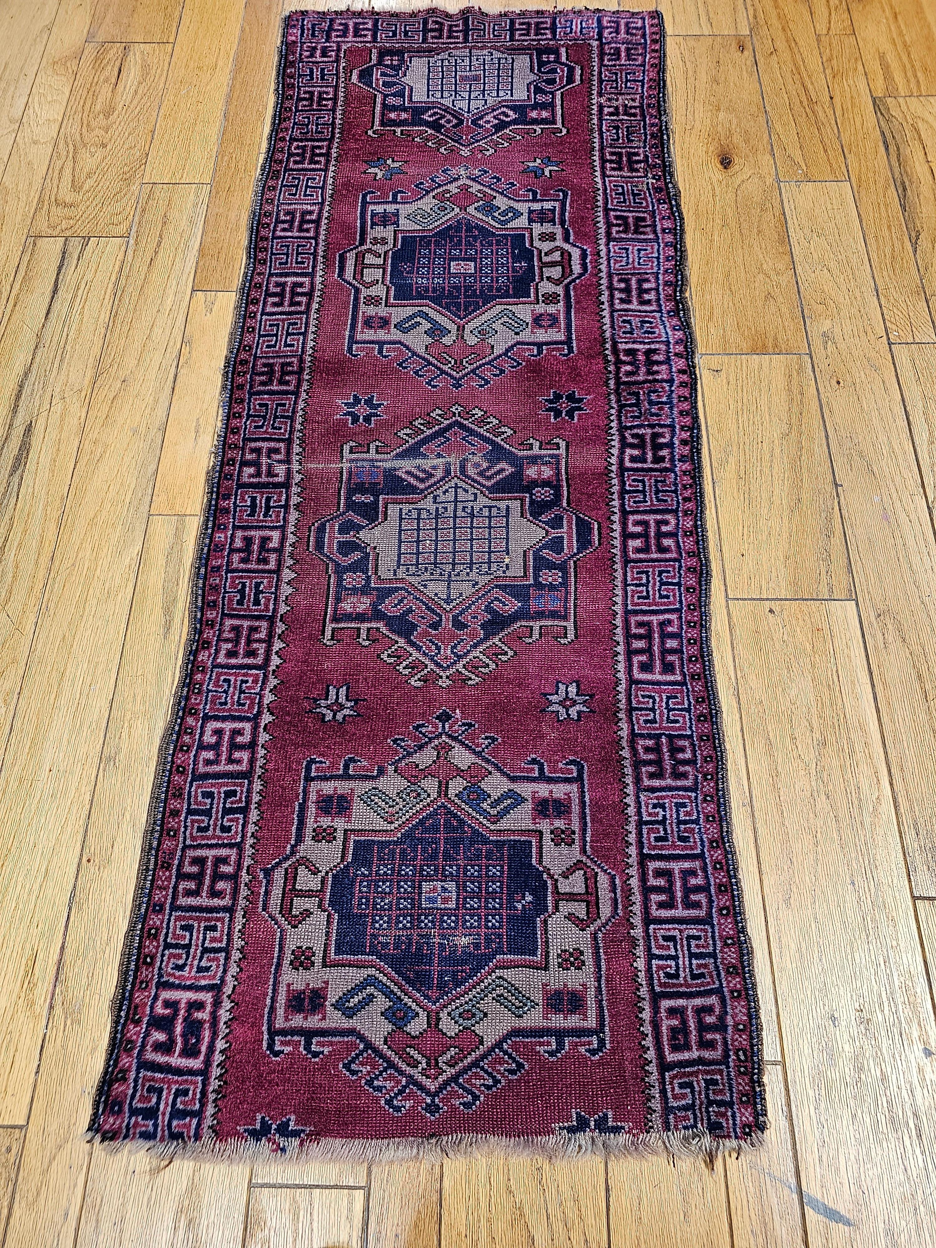 20th Century Vintage Turkish Runner in a Geometric Pattern in Red, Navy, Green, Blue, Ivory For Sale