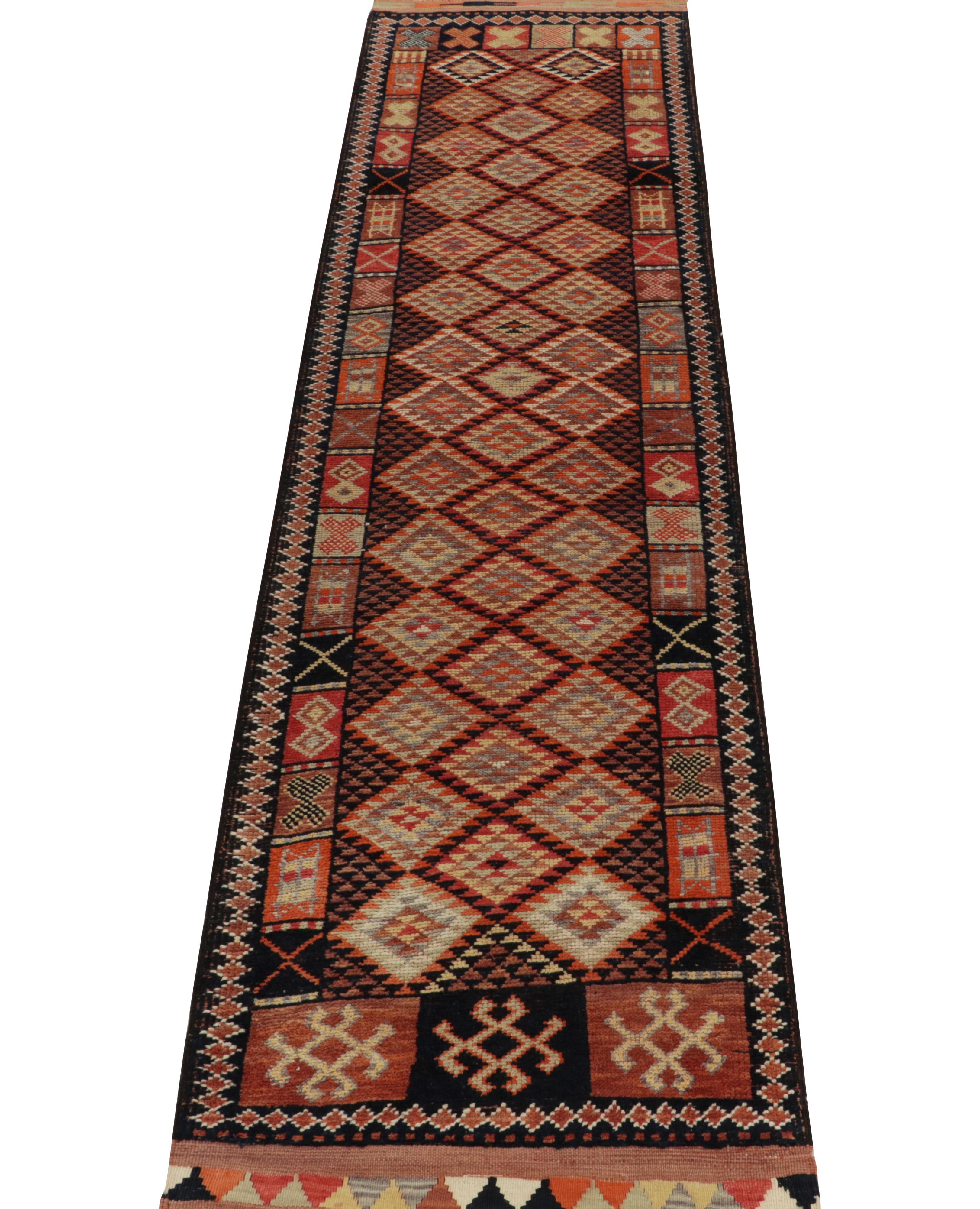 Tribal Vintage Turkish runner in Orange, Black & Beige Geometric Pattern by Rug & Kilim For Sale
