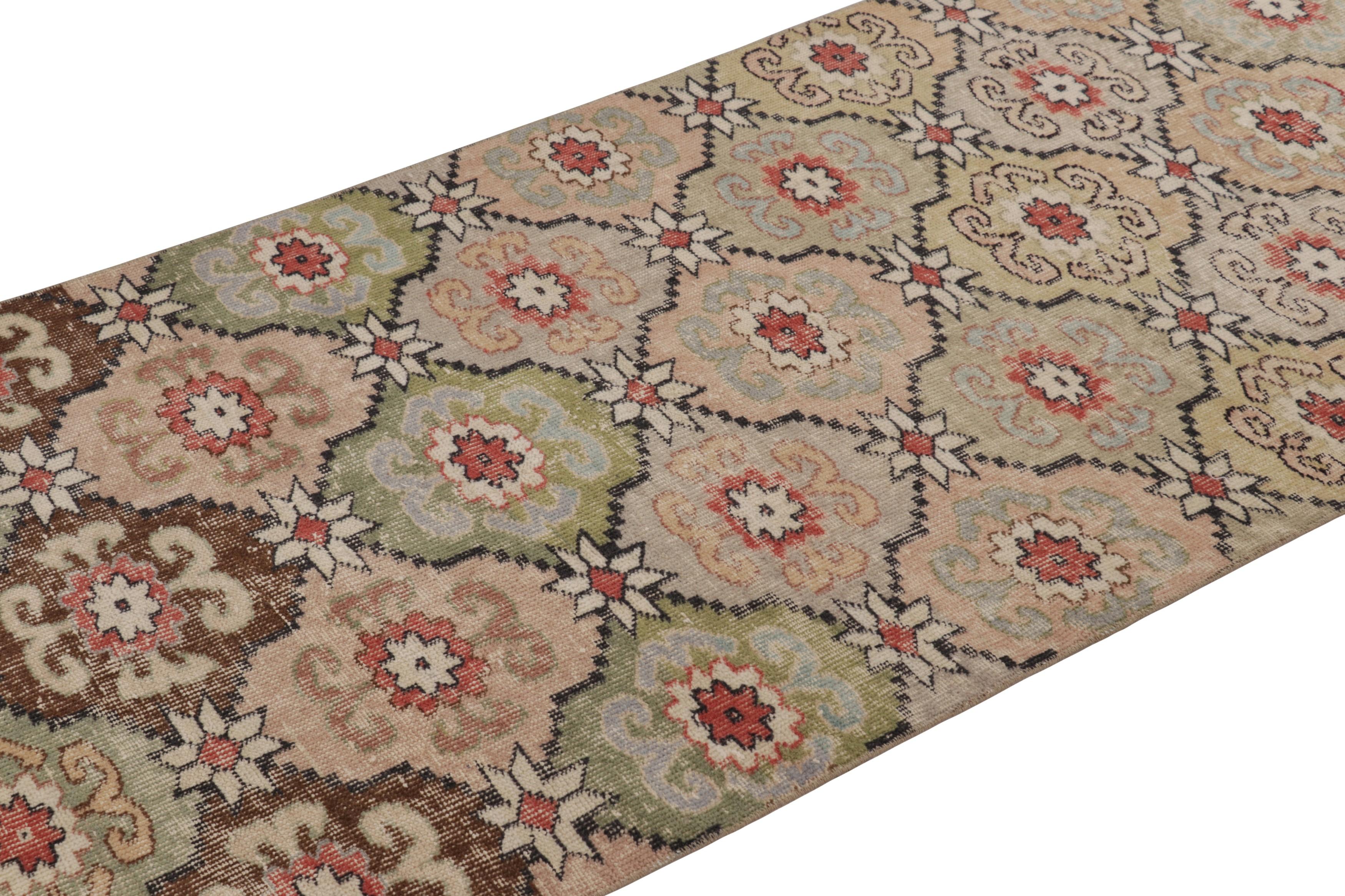 Hand knotted in wool and originating in Turkey circa 1950-60, this 3x8 vintage runner rug is an exciting new curation from Rug & Kilim’s collection of one-of-a-kind mid-century Turkish pieces. 

On the Design:

A beige-brown field underscores