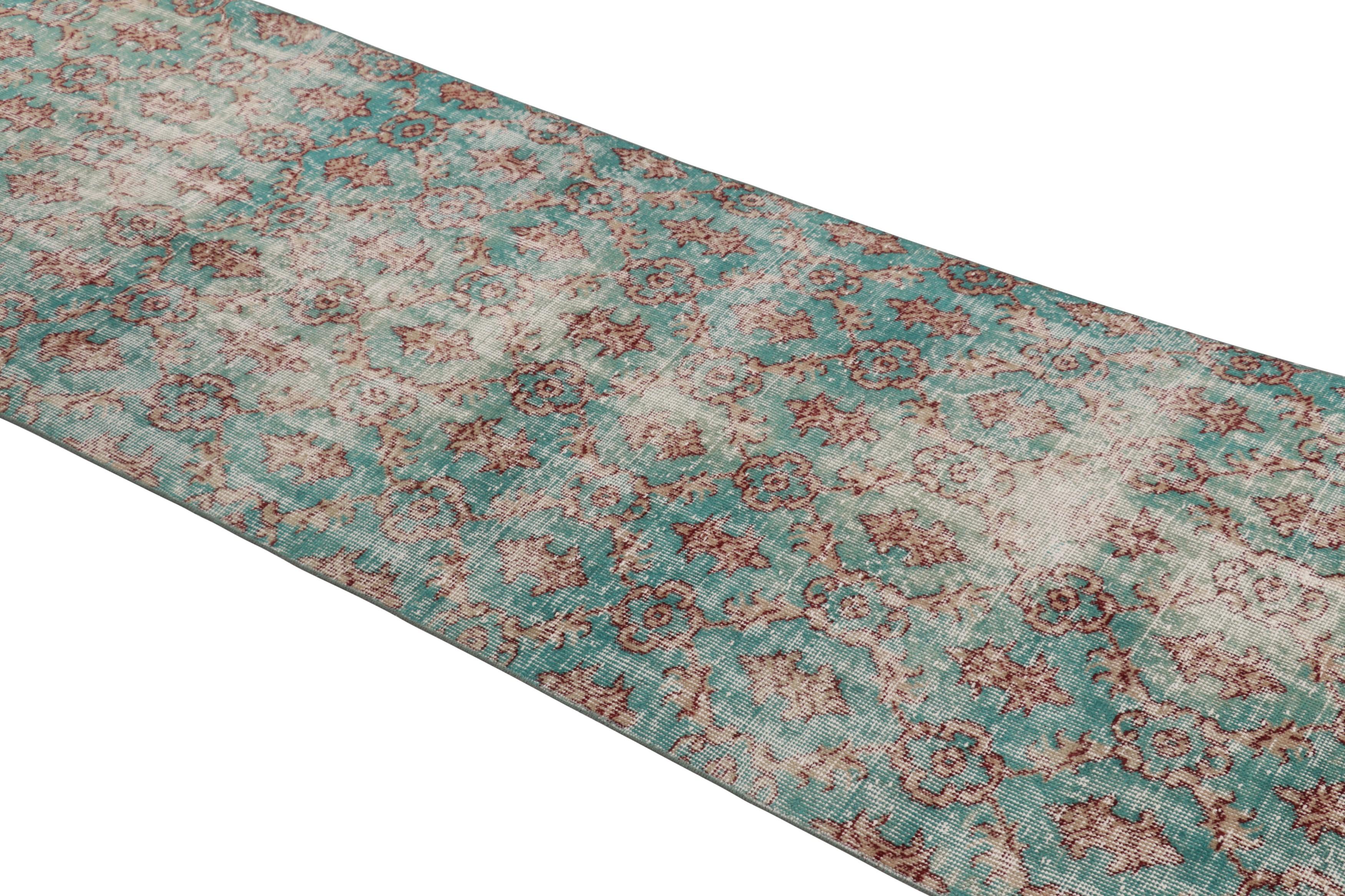Hand knotted in wool and originating in Turkey circa 1950-60, this 3x10 vintage runner rug is an exciting new curation from Rug & Kilim’s collection of one-of-a-kind mid-century Turkish pieces. 

On the Design:

A teal blue field underscores