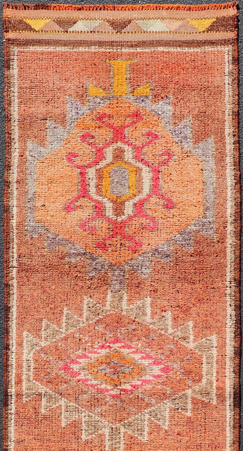 Hand-Knotted Vintage Turkish Runner with Large Medallion Kurdish Design in Earthy Tones For Sale