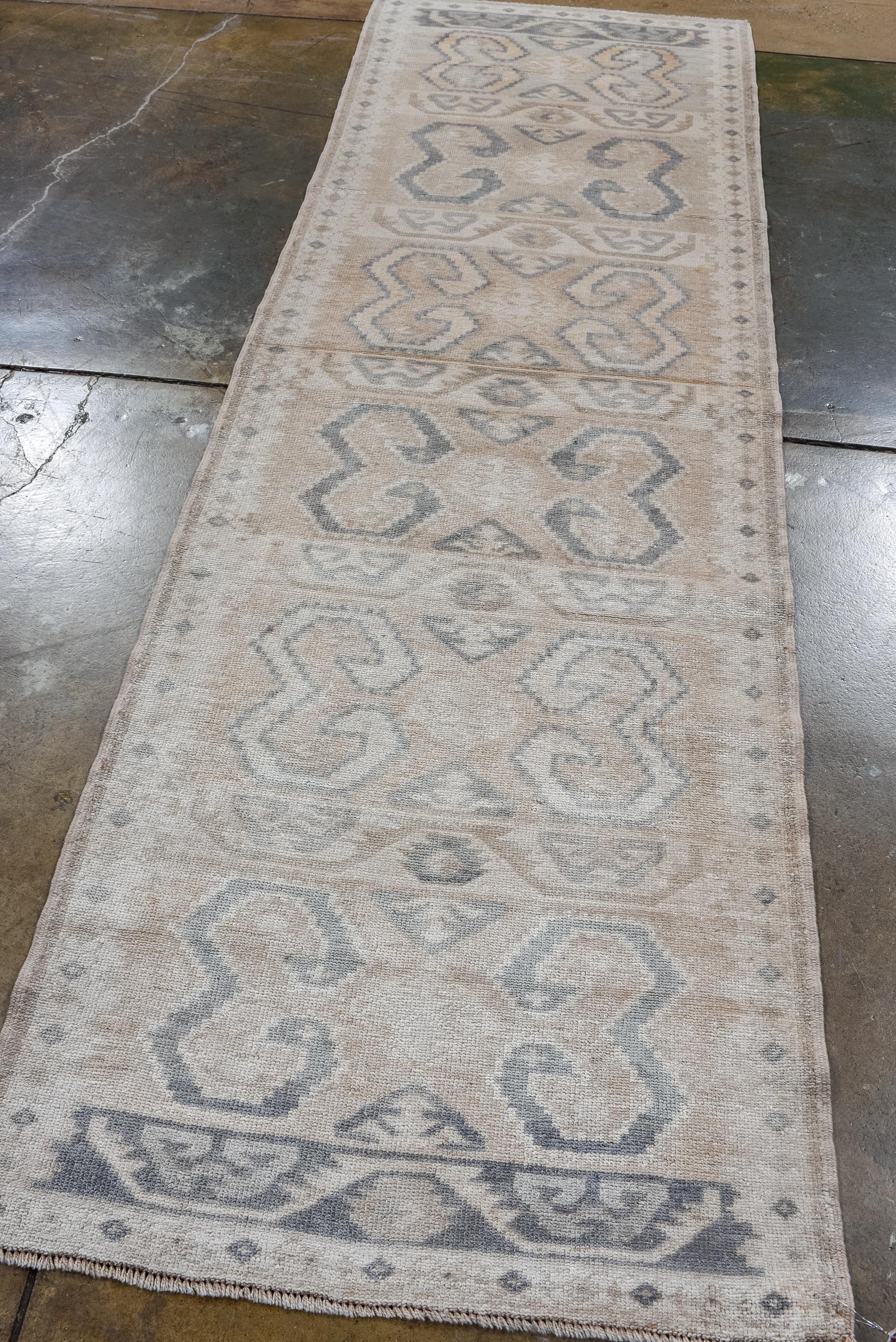 Hand-Knotted Vintage Turkish Runner with Soft Tones  For Sale