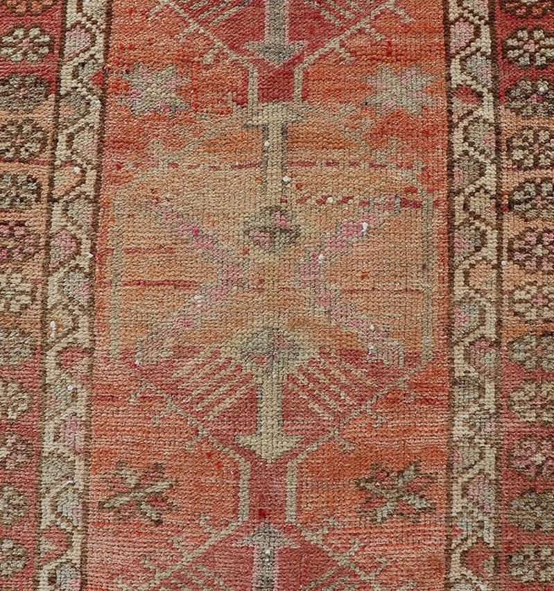Vintage Turkish Runner with Tribal Medallion Design in Variegated Red In Good Condition For Sale In Atlanta, GA