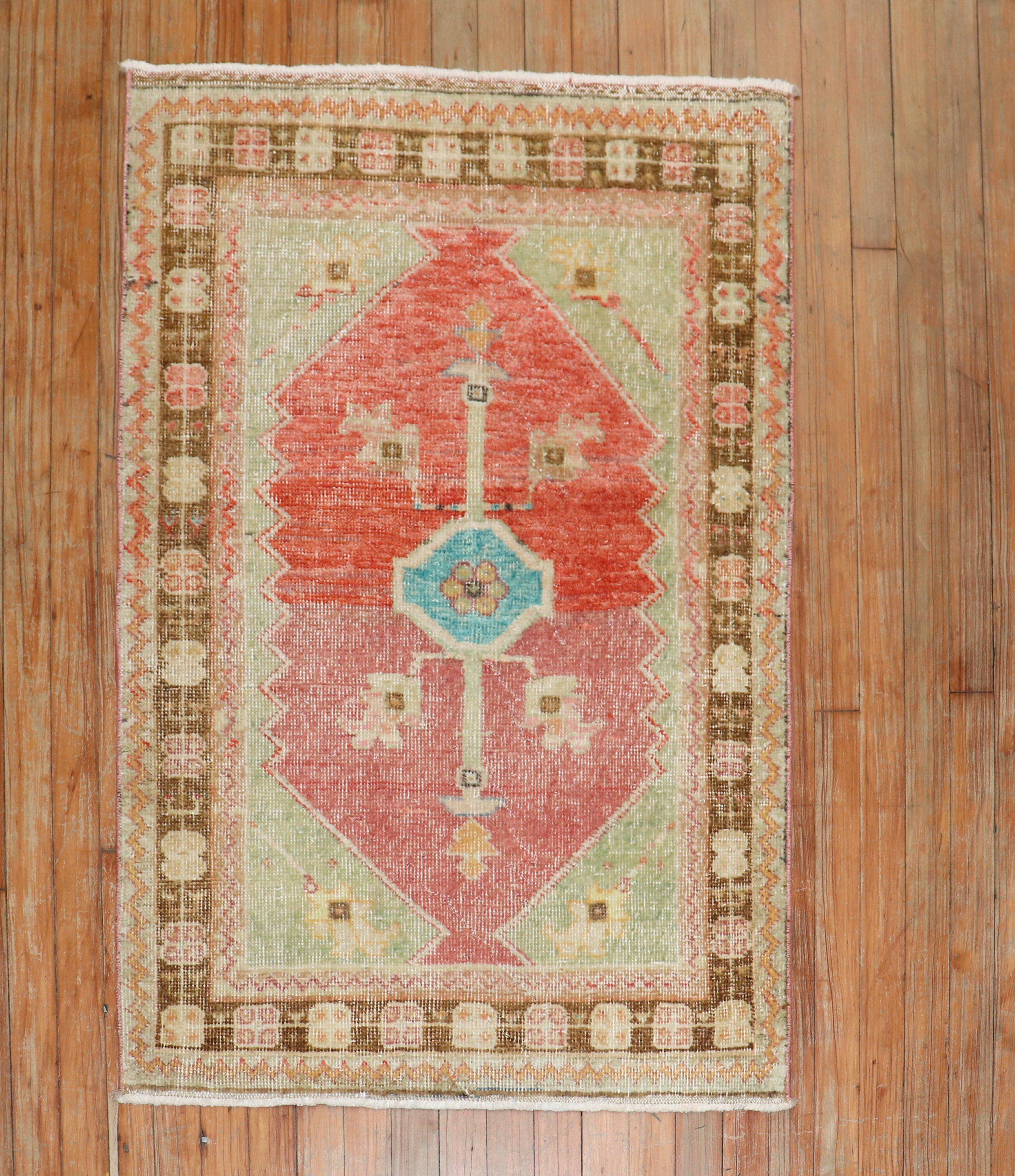 A vintage mid-20th century Anatolian Turkish rug scatter size colorful rug

Measures: 2'9' x 3'10