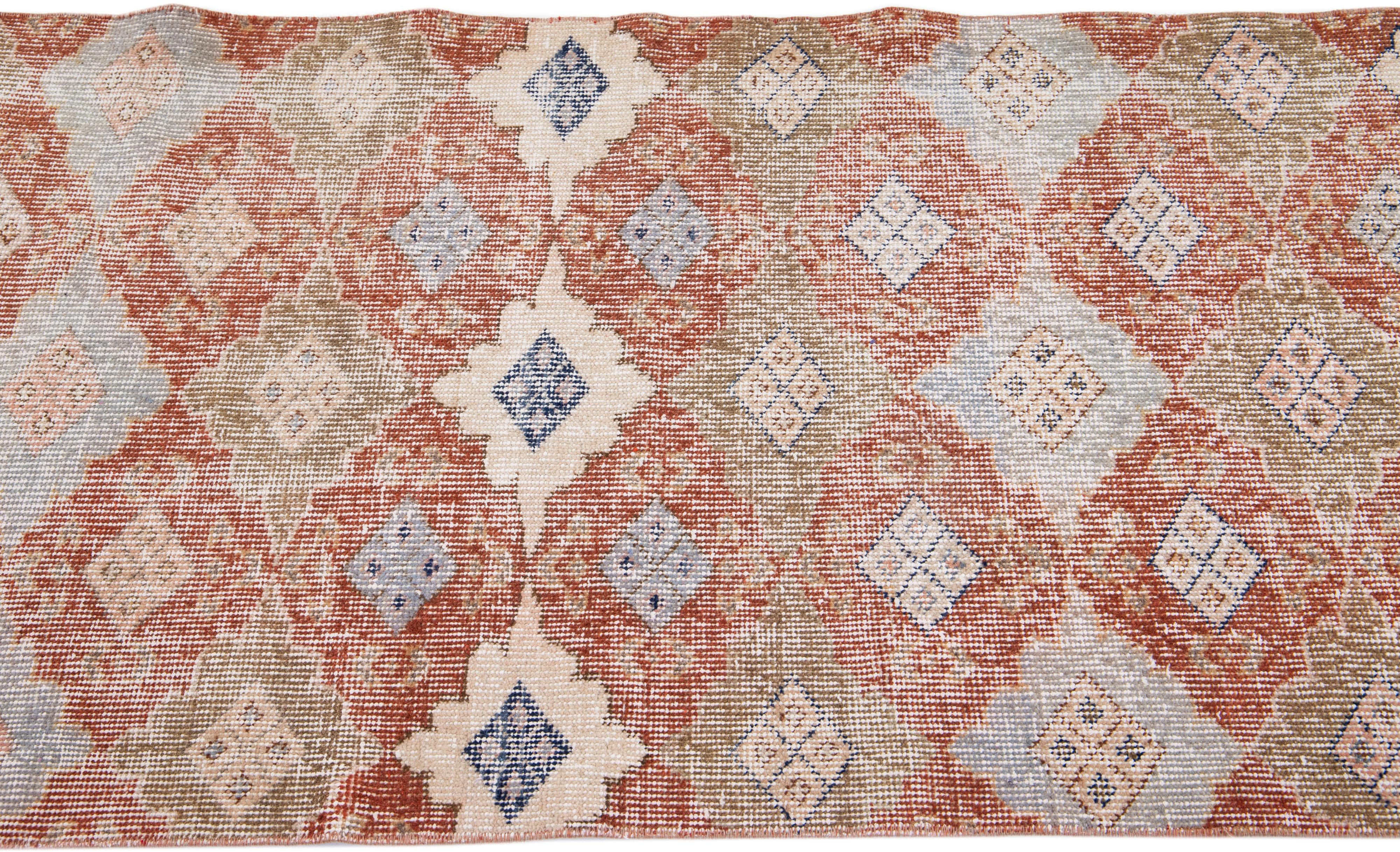 Tribal Floral Hanmdade Vintage Turkish Scatter Wool Rug In Rust For Sale
