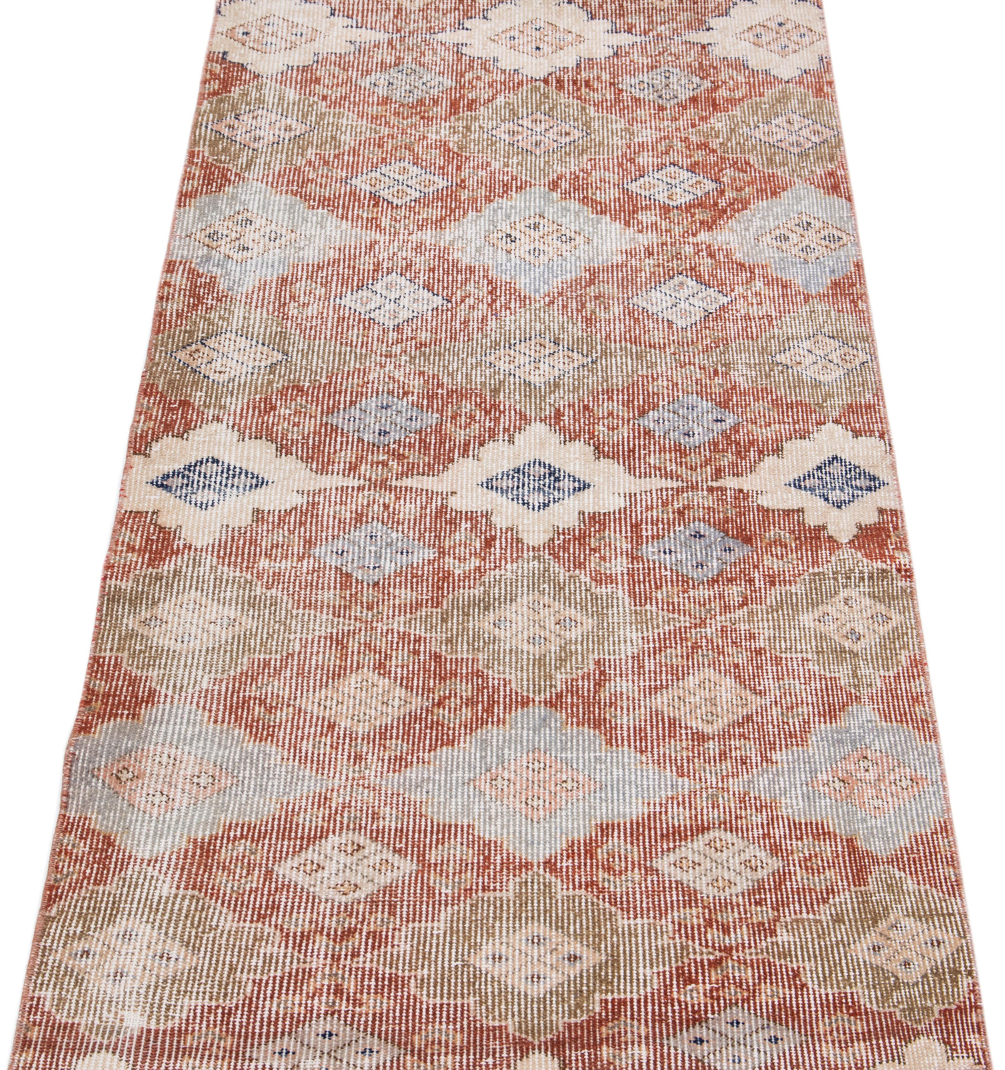 Beautiful vintage Turkish rug, hand knotted wool with a multi-color field in a gorgeous all-over geometric tribal design.

This rug measures: 2'8