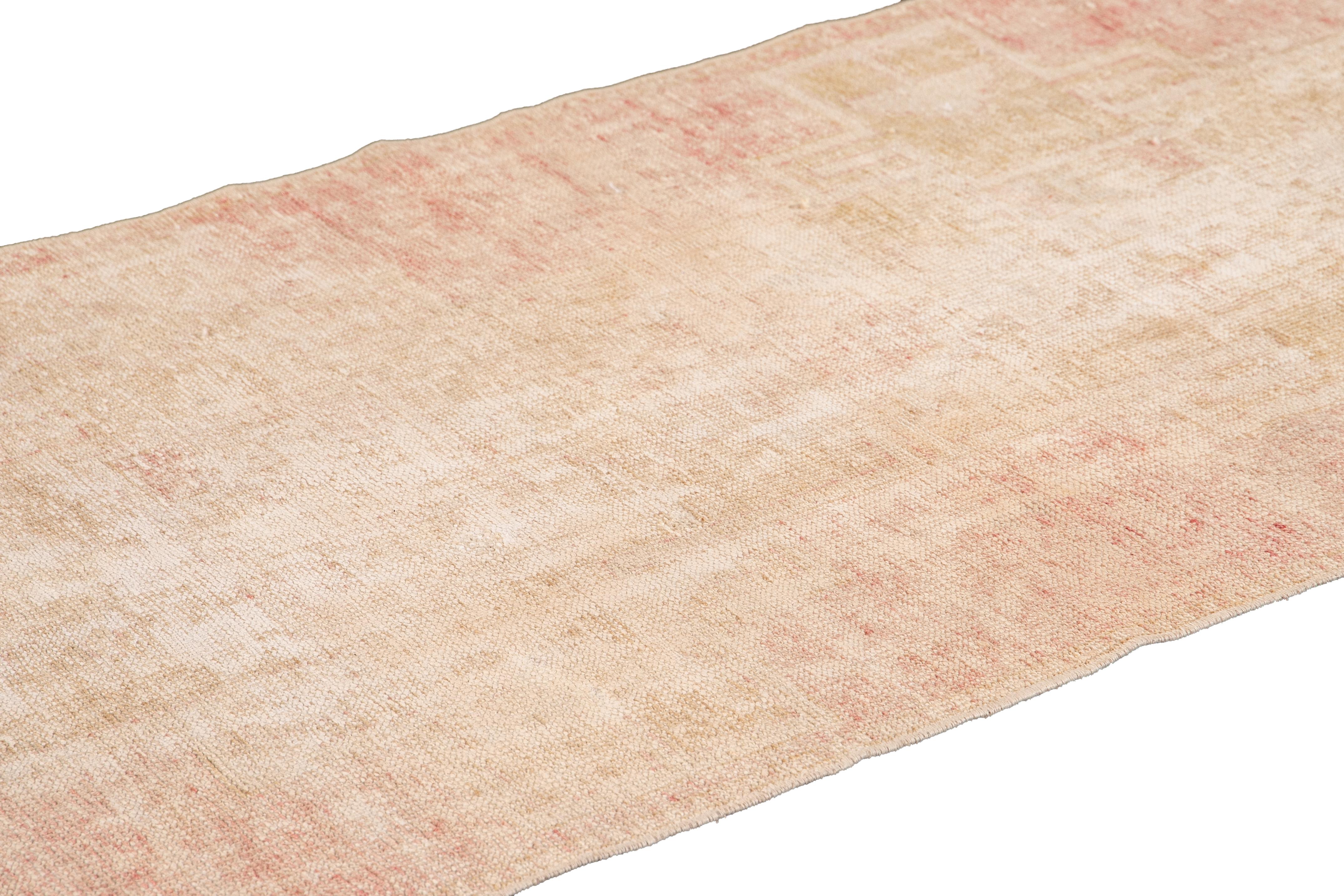 Vintage Turkish Shabby Chic Beige and Pink Handmade Geometric Wool Runner In Distressed Condition For Sale In Norwalk, CT