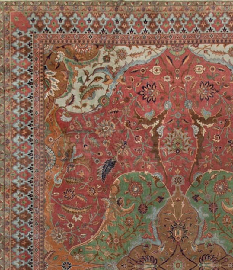 The wonderful composition and colors in this rug go to create something very special in look and effect. The green central design enclosing a soft brown medallion with powder blue edges is so well offset by the main rose ground which is itself