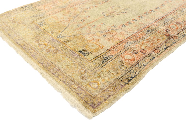 74891, vintage Turkish Sivas Prayer rug. This vintage Turkish Sivas prayer rug expresses an atmospheric design in desirably time-softened pastel hues. Multiple decorative guard bands frame the composition surrounding the mihrab niche and hanging