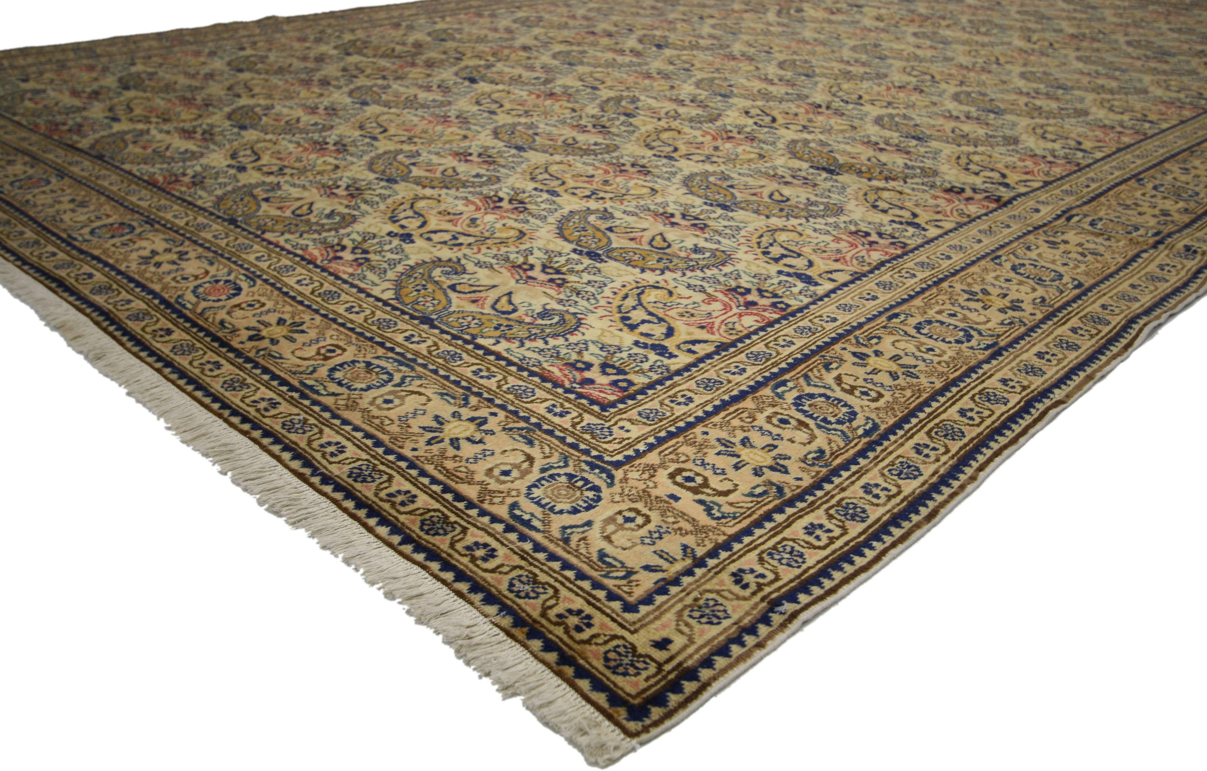 73476, vintage Turkish Sivas rug. This hand knotted wool vintage Turkish Sivas rug displays an all-over repetitive paisley pattern of opulent boteh motifs. The widely used boteh motif is thought to symbolize life with its resemblance to a number of