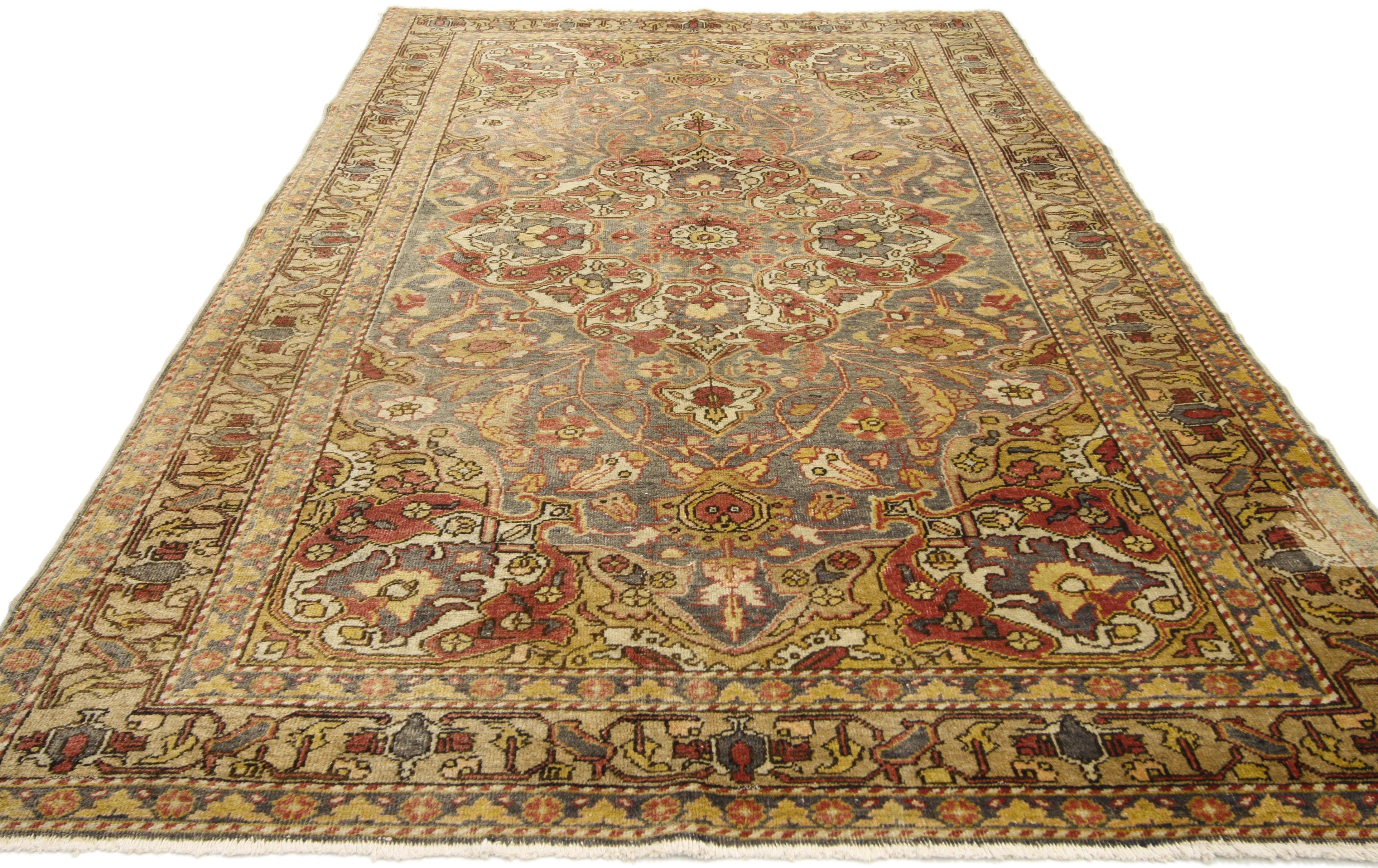 73780 Vintage Turkish Sivas rug with Rustic Cottage & Crafts style. With architectural elements of curved forms and decorative detailing, this hand knotted wool vintage Turkish Sivas rug features a rosette and palmette center medallion surrounded by