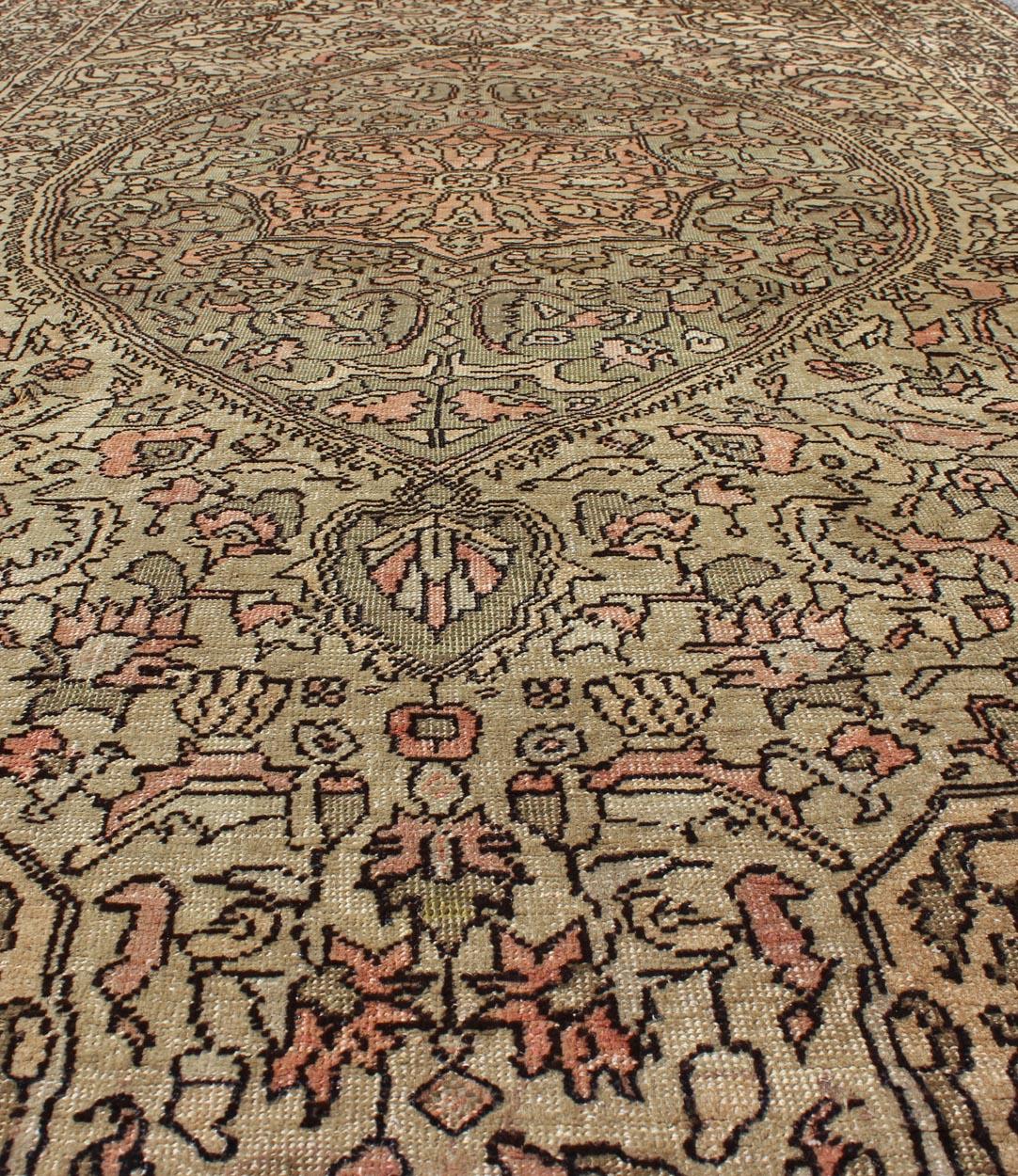 20th Century Vintage Turkish Sivas with Floral Central Medallion in Coral and Earthy Tones For Sale