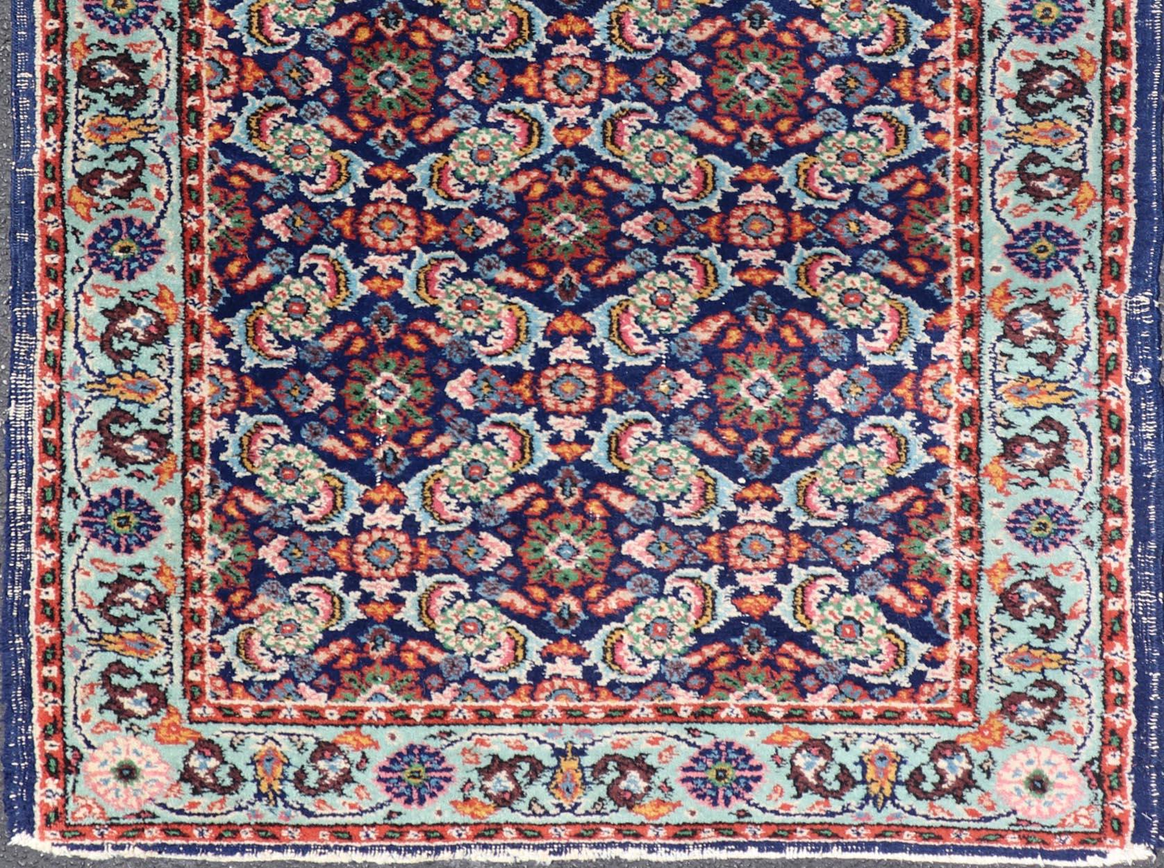 Measures: 3'0 x 5'0 
Vintage Turkish Sparta Oushak Rug in Deep Blue, Red, and Green 3'0 x 5'0.
Keivan Woven Arts / Rug/ AVI-0203, country of origin / type: Turkey / Oushak, circa 1950.

The vibrant red and green floral motifs are delicately balanced