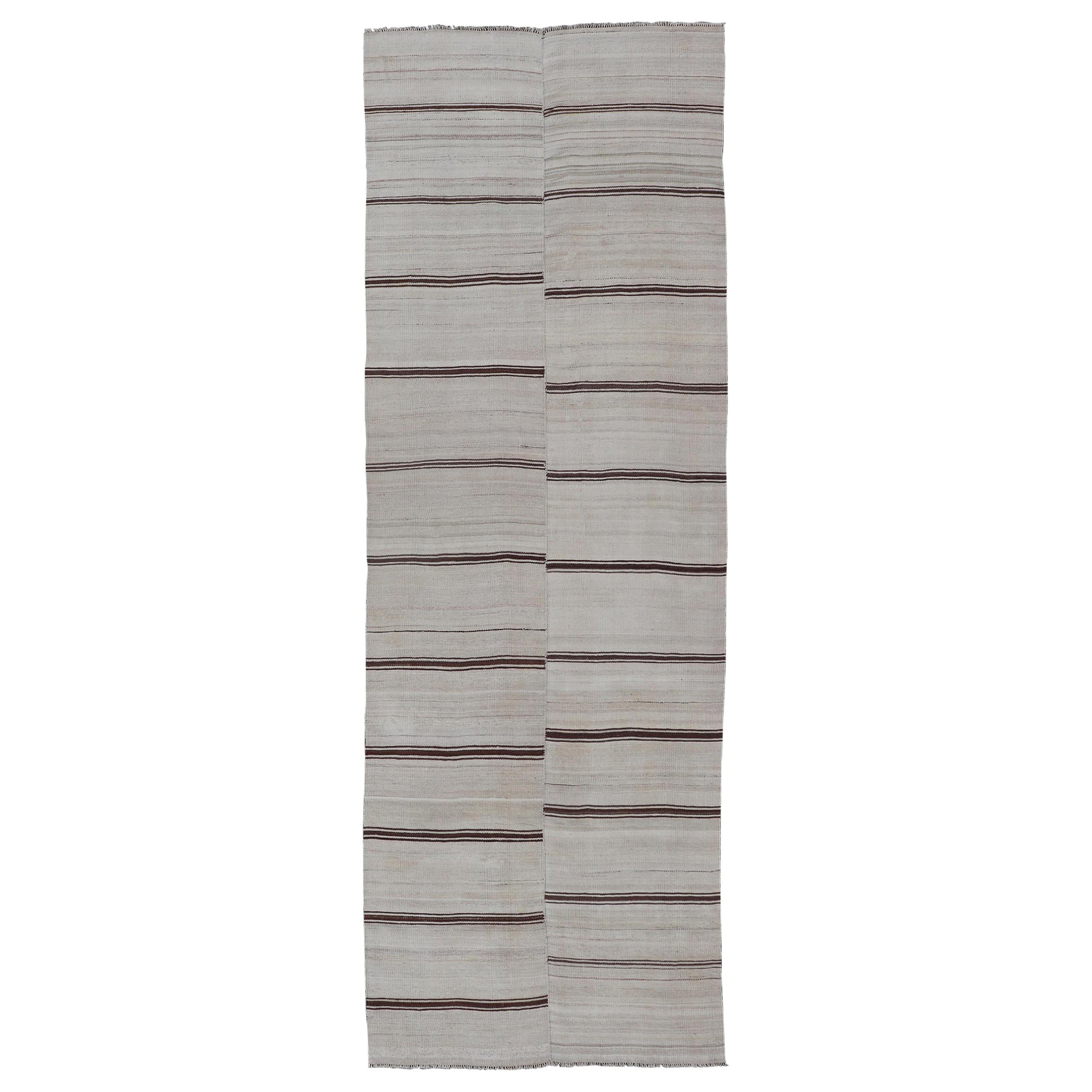 Vintage Turkish Striped Kilim Gallery in Braun
Creme 4
2 x 12
8