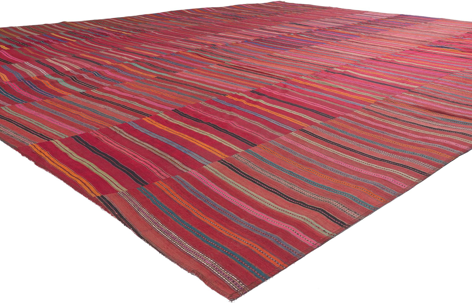 60639 Vintage Turkish Striped Kilim Rug, 11'00 x 13'02.
Rugged beauty meets rustic sensibility in this handwoven wool vintage Turkish kilim rug. The striped design and vibrant colors woven into this piece work together creating a modern yet cozy
