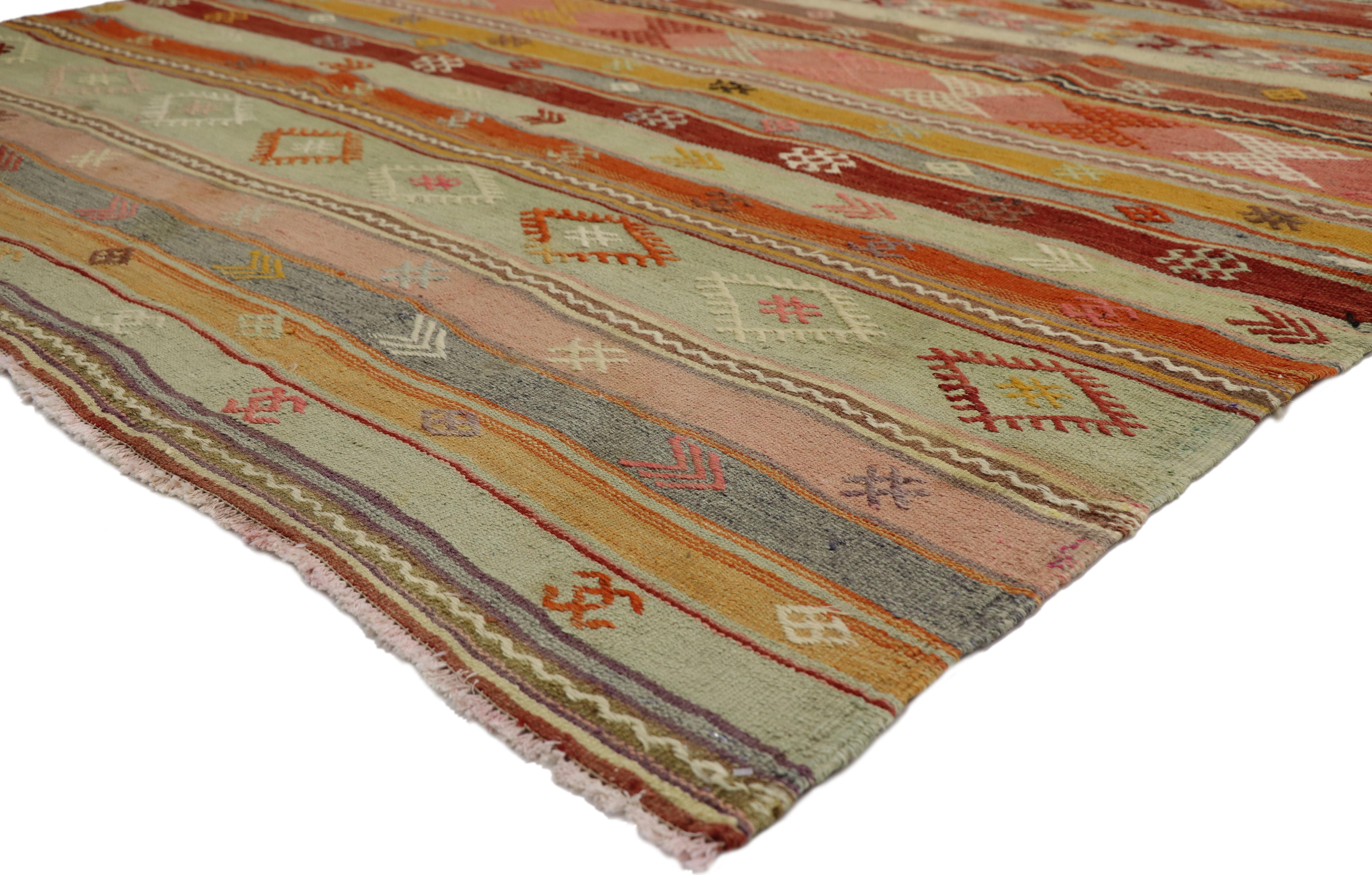 51237, vintage Turkish Striped Kilim rug with Bohemian Tribal style, flat-weave rug. This handwoven wool vintage Turkish striped Kilim rug features double colored bands in alternating colors dotted with a few symbolic Turkish motifs on a warm brown