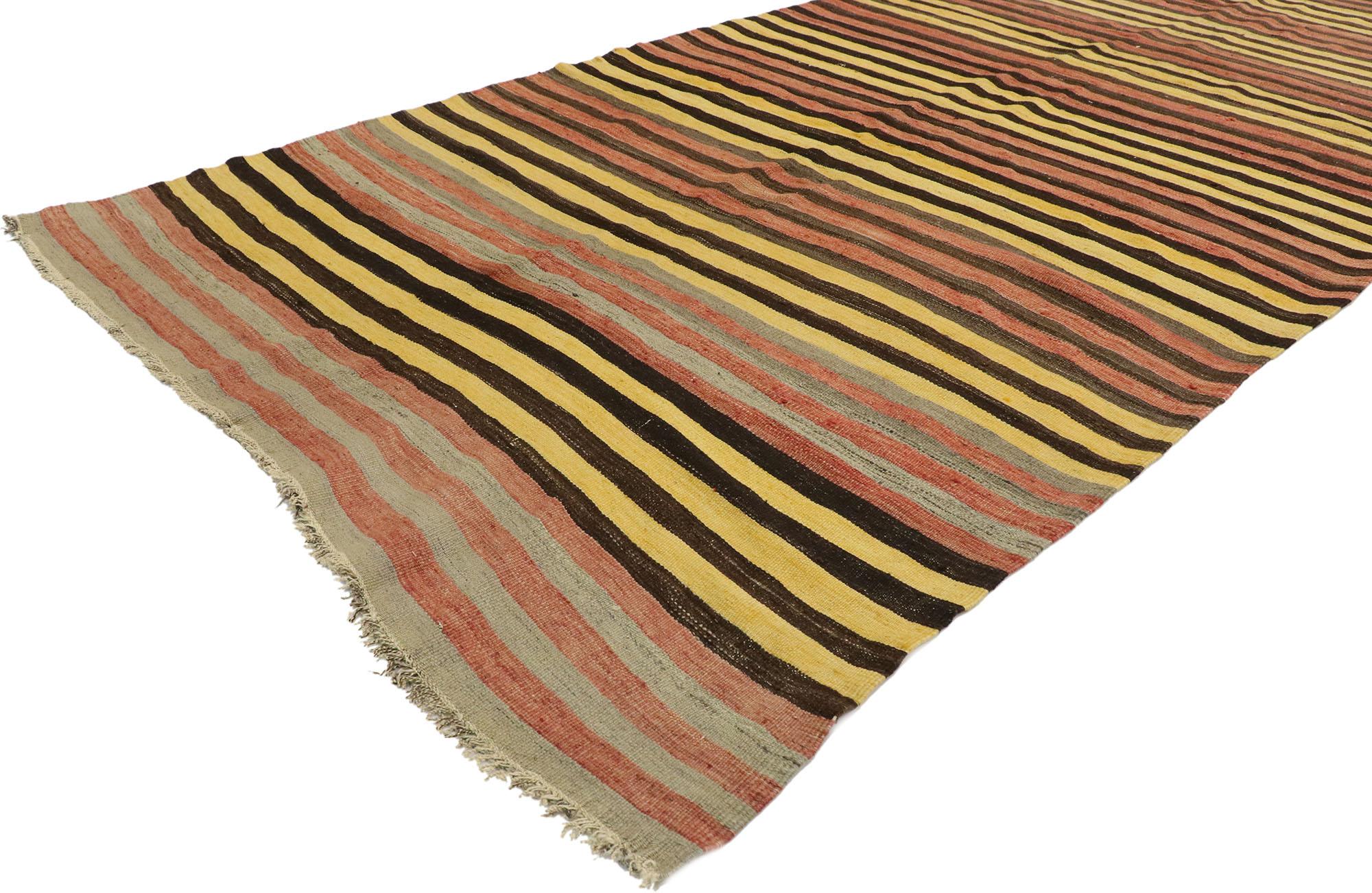 53116 vintage Turkish striped Kilim rug with Mid-Century Modern style. With its warm hues and rugged beauty, this hand-woven wool striped kilim rug manages to meld contemporary, modern, and traditional design elements. The flat-weave kilim rug