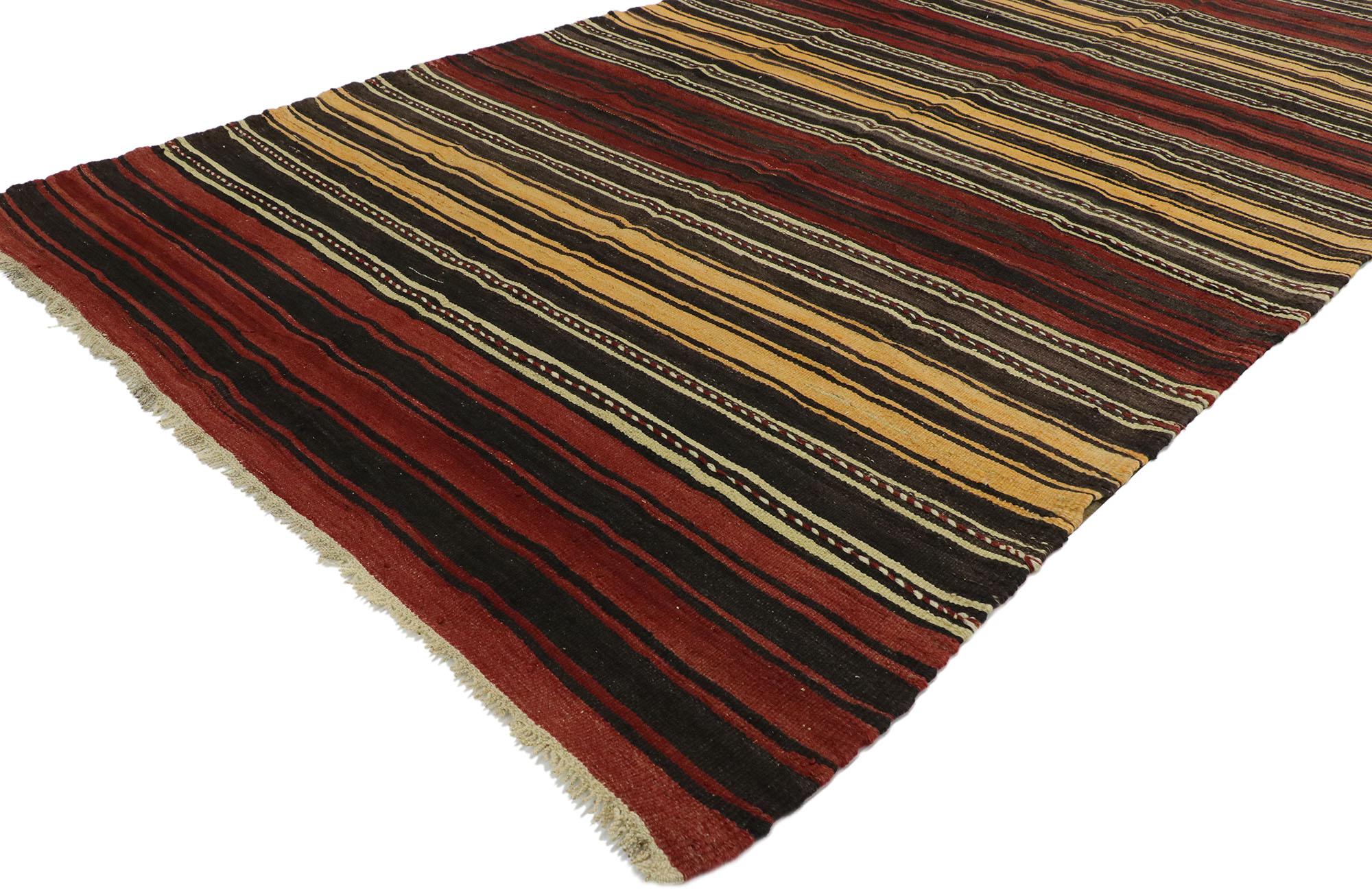 53131, vintage Turkish striped kilim rug with modern cabin style. With its warm hues and rugged beauty, this handwoven wool striped kilim rug manages to meld contemporary, modern, and traditional design elements. The flat-weave kilim rug features a