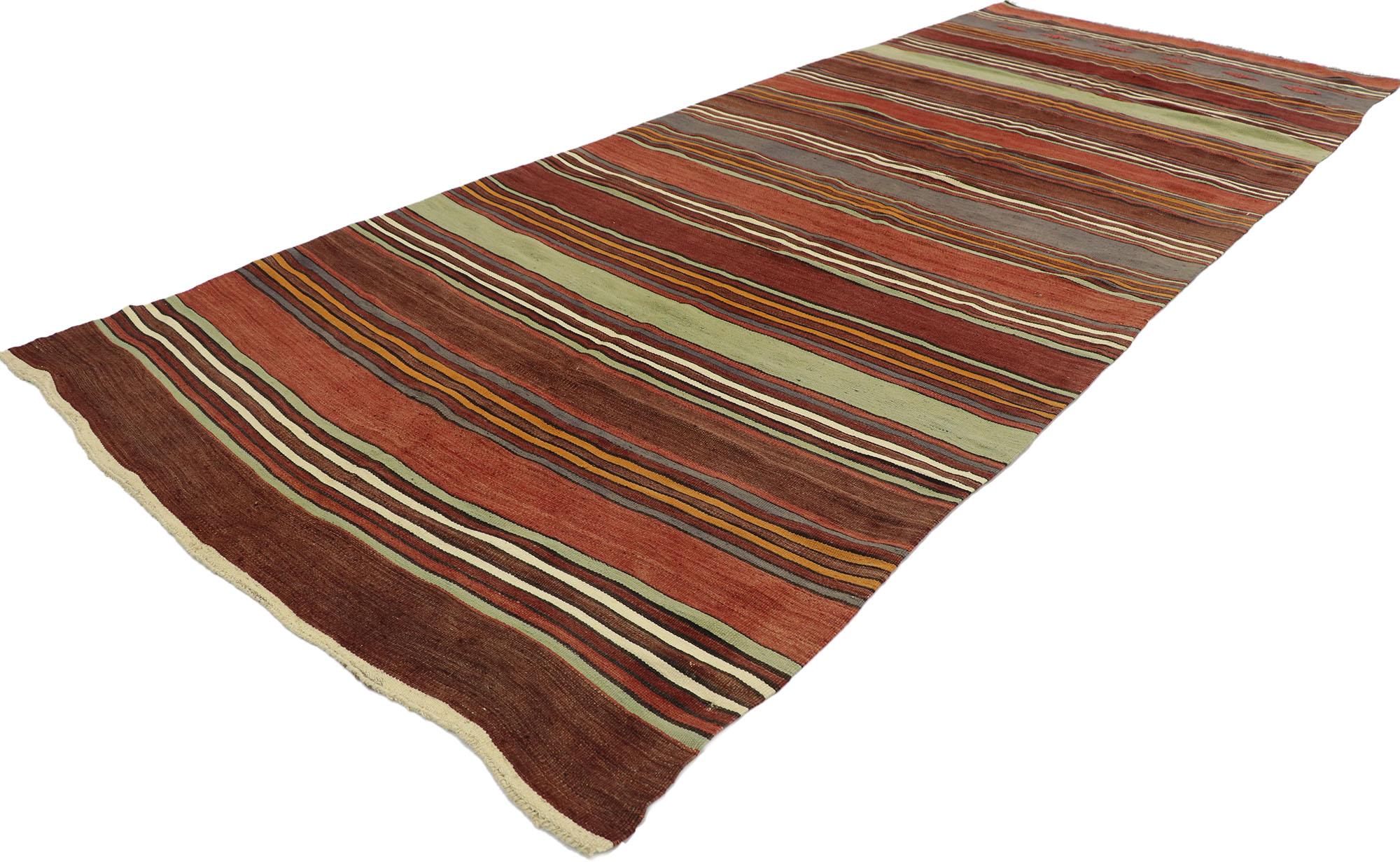 53135, vintage Turkish striped Kilim rug with modern cabin style. With its warm hues and rugged beauty, this handwoven wool striped kilim rug manages to meld contemporary, modern, and traditional design elements. The flat-weave kilim rug features a