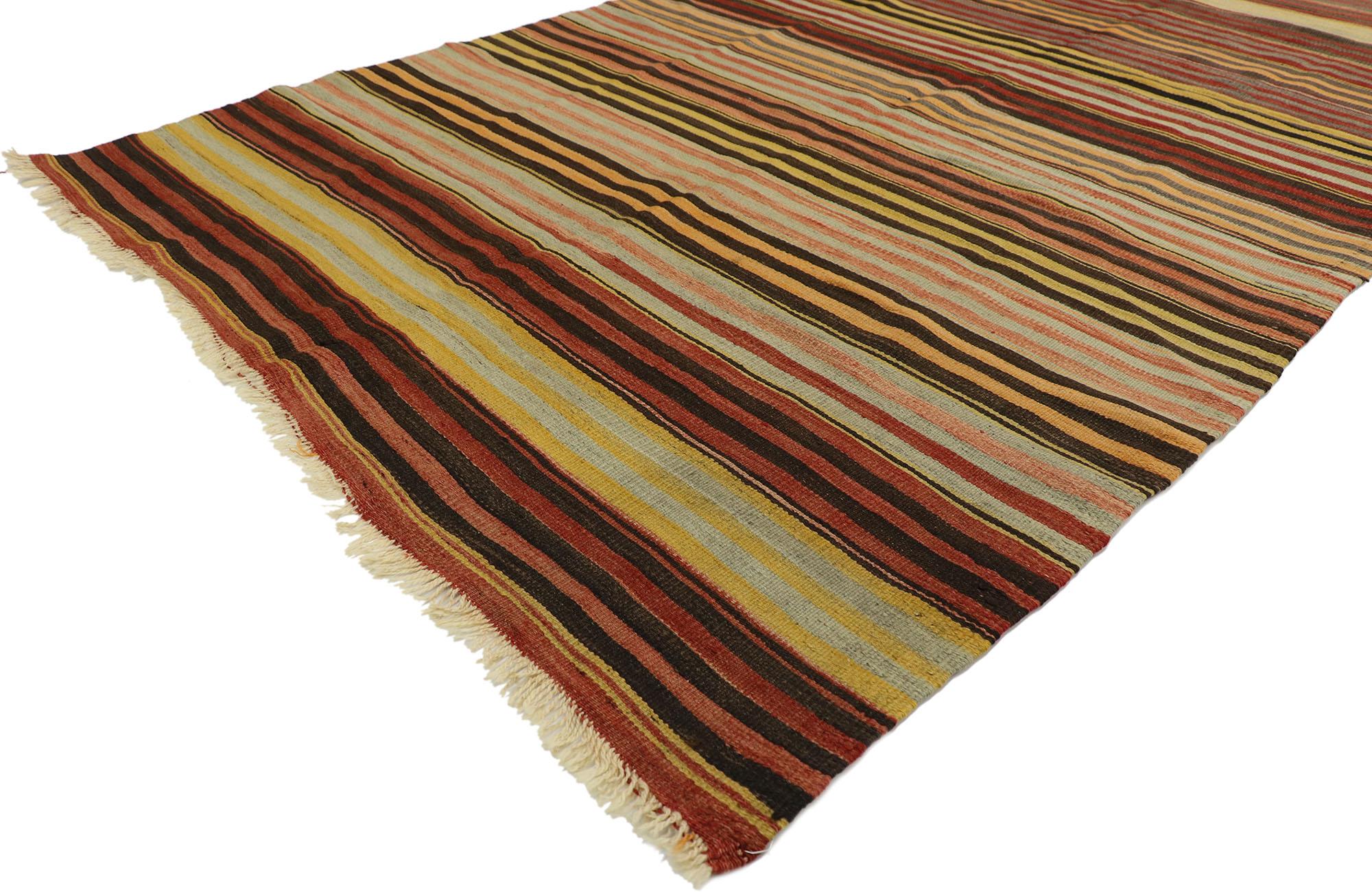 53125, vintage Turkish Striped Kilim rug with Modern Rustic Cabin style. With its warm hues and rugged beauty, this handwoven wool striped Kilim rug manages to meld contemporary, modern, and Traditional Design elements. The flat-weave Kilim rug