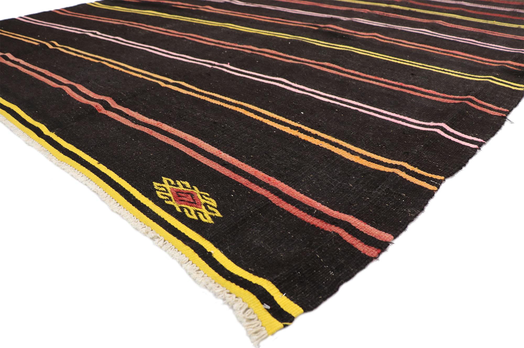 51304 vintage Turkish Striped Kilim rug with Tribal Bohemian style, flat-weave rug. This handwoven wool vintage Turkish striped Kilim rug features double colored bands in vibrant colors dotted with symbolic Turkish motifs on a warm brown background.
