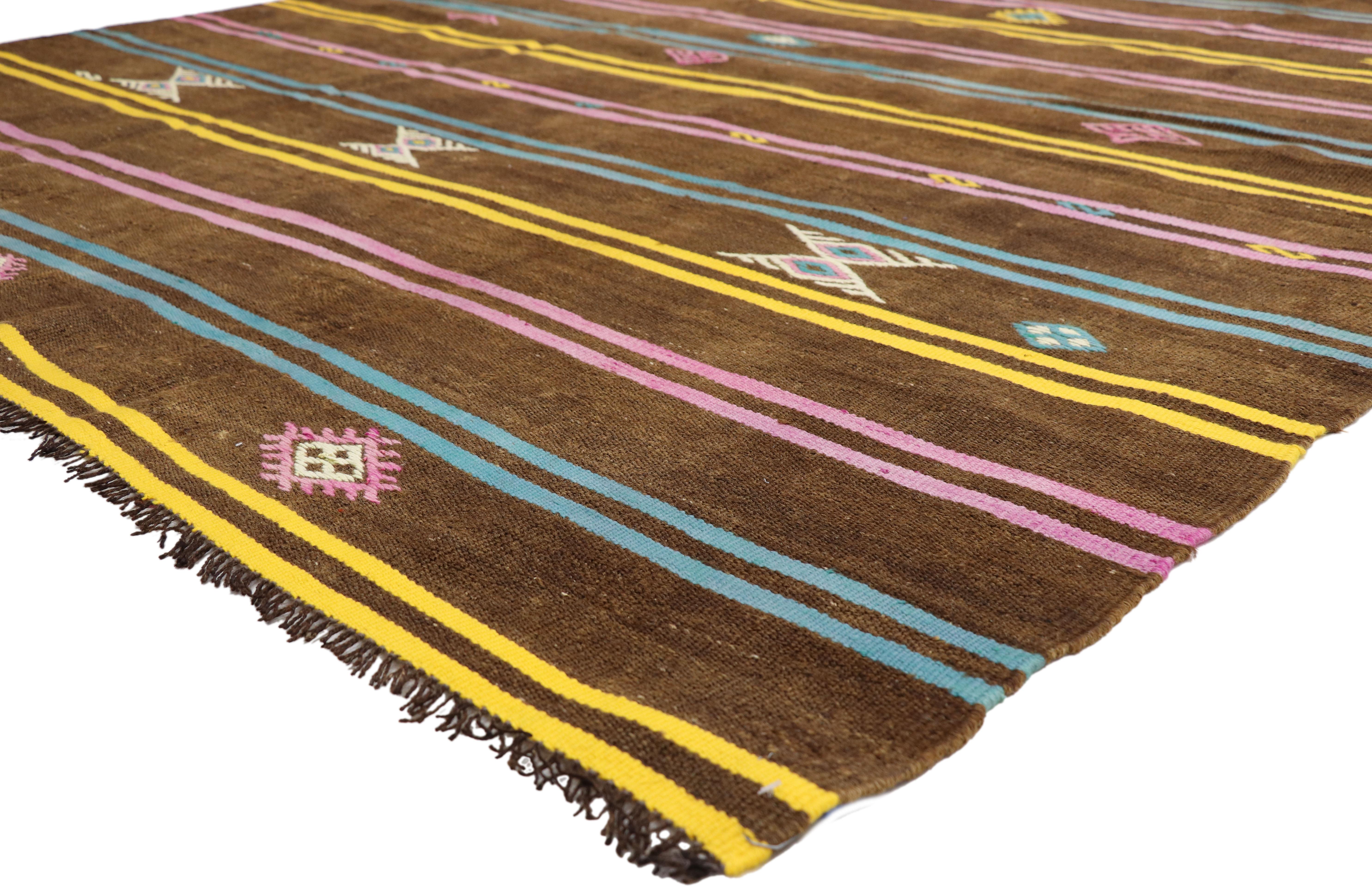 51305 Vintage Striped Turkish Kilim Rug, 07'00 X 11'07. Crafted with care and precision, this handwoven wool vintage Turkish Kilim rug showcases double-colored bands in vibrant hues set against a rich warm brown backdrop, punctuated with symbolic