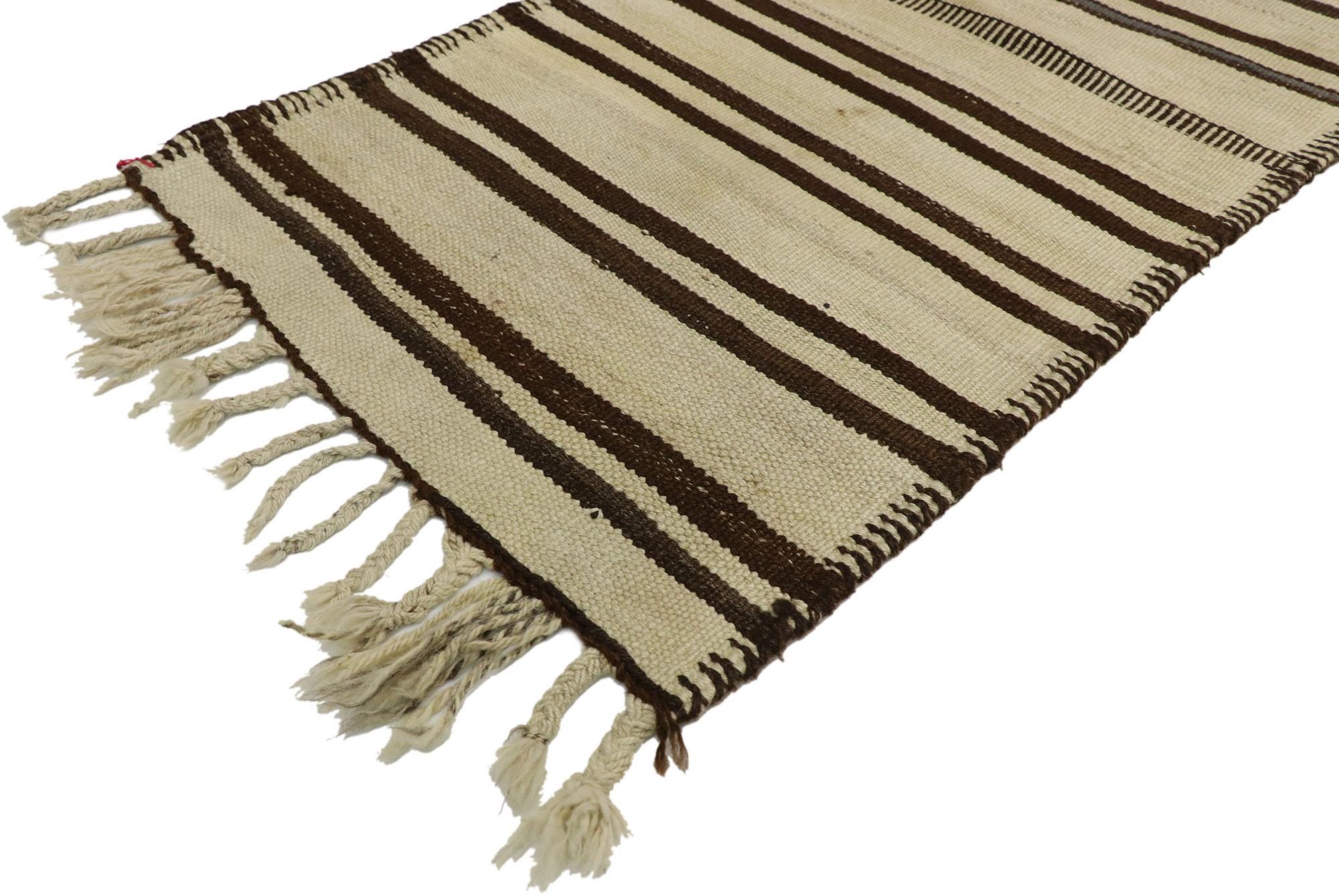 53138, vintage Turkish striped Kilim runner with Modern style. With its warm hues and rugged beauty, this handwoven wool vintage Turkish kilim rug features a modern style, yet it still reflects an understated appearance ideal for modern,