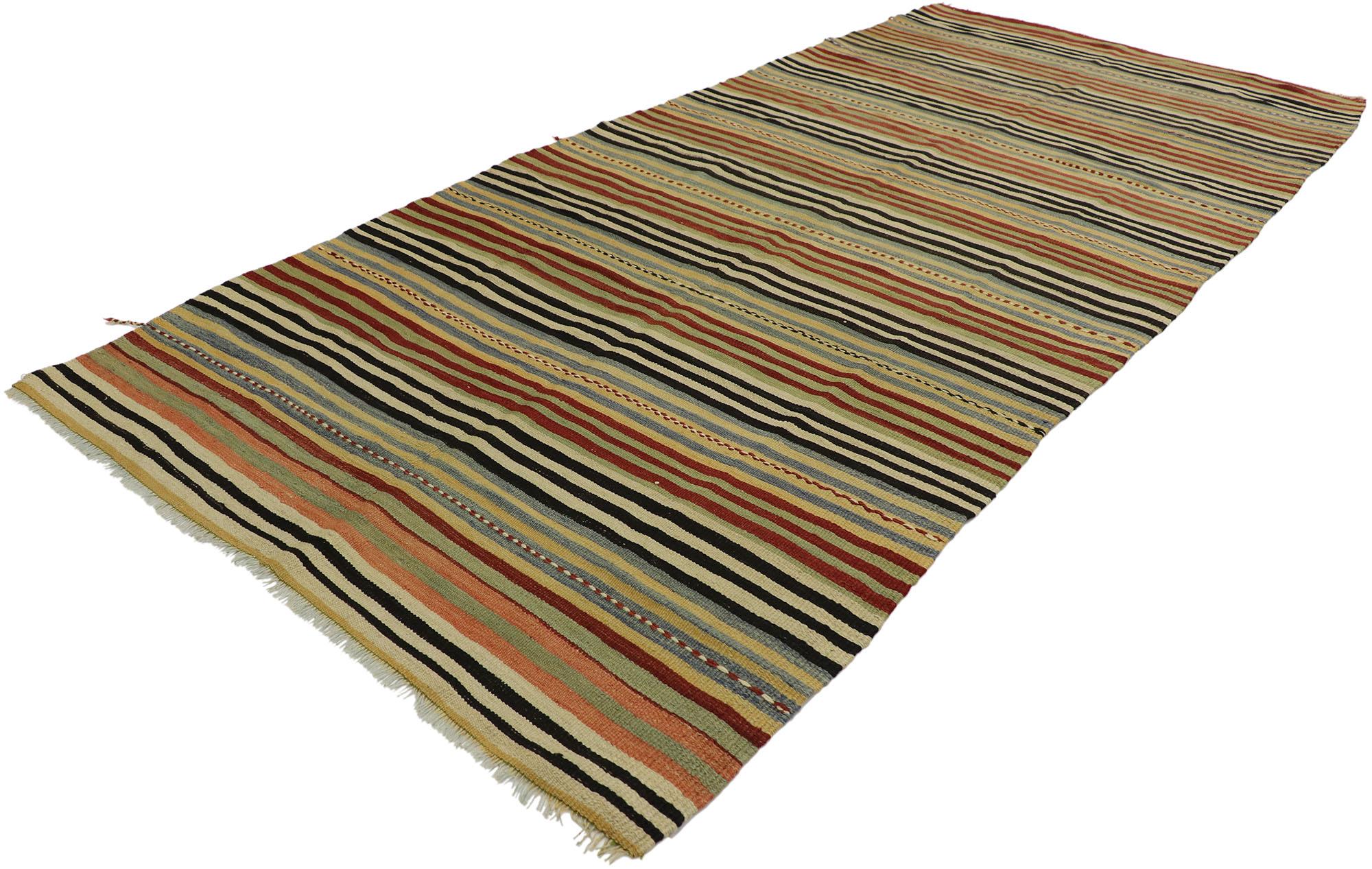 53137, vintage Turkish Kilim runner with Rustic Modern style. With its warm hues and rugged beauty, this handwoven wool striped Kilim rug manages to meld contemporary, modern, and Traditional Design elements. The flat-weave Kilim rug features a