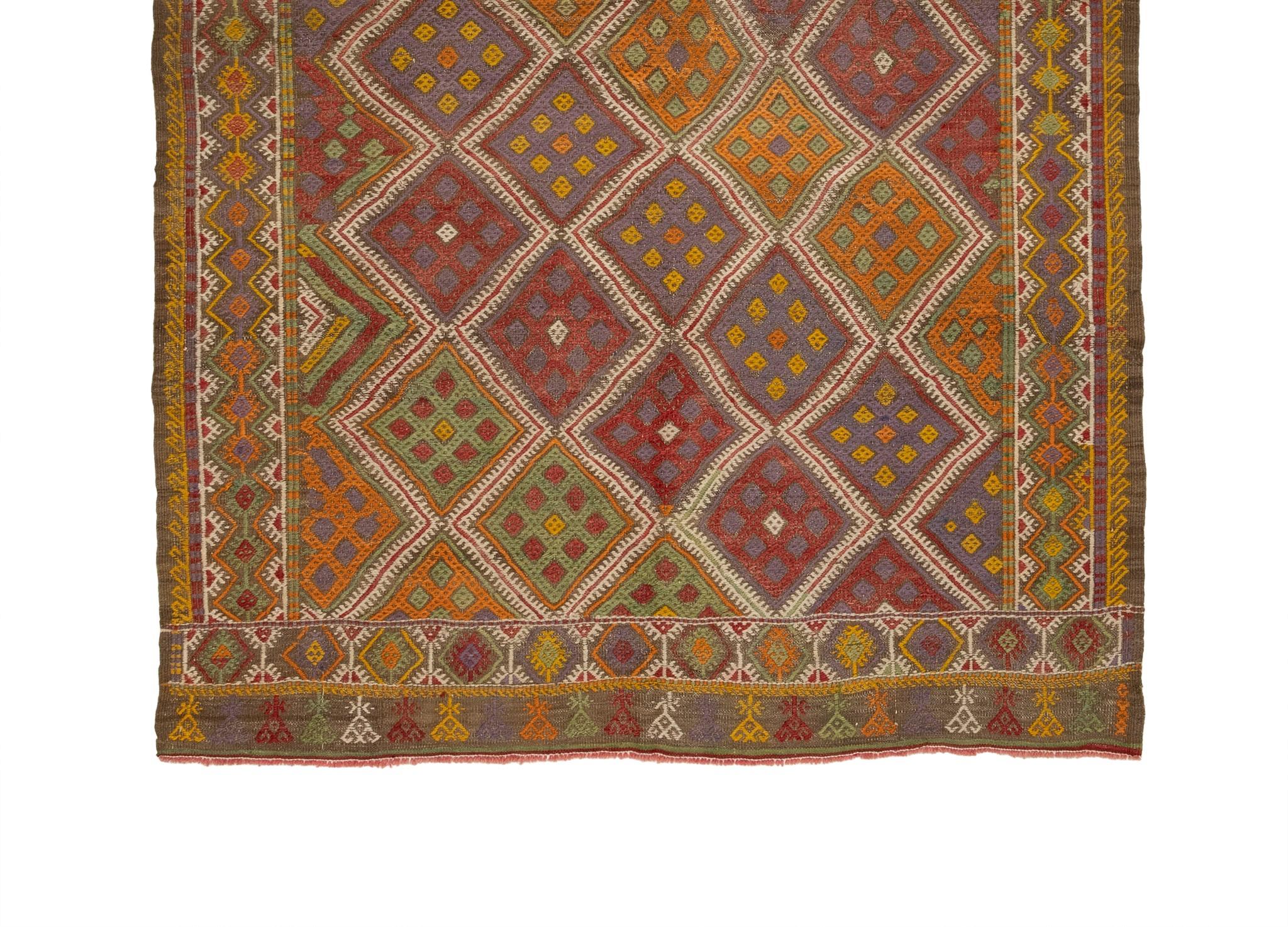 This is a beautiful example of a northern Turkish sumak kilim with stylized geometric design with rich beautiful colors. This rug is woven with hand spun wool.
