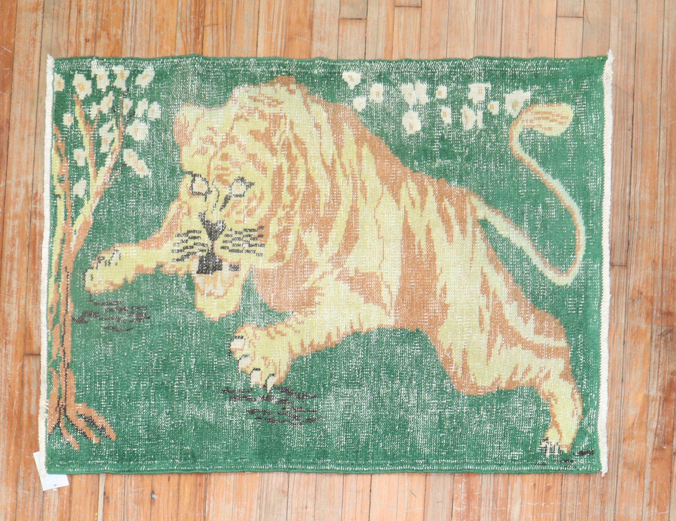 Late 20th century one-of-a-kind Turkish pictorial depicting a tiger on a green ground. RAAARRRR!!!

Measures: 2'11'' x 3'10''.
