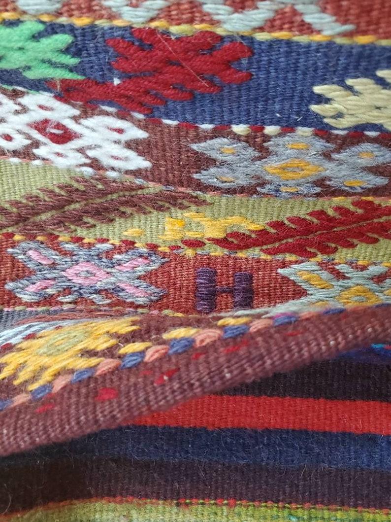 Vintage Turkish Tribal Hand Woven Wool Kilim Saddle Bag For Sale 2