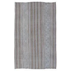 Vintage Turkish Tribal Kilim Rug with Soft Beige and Light Brown Stripes.