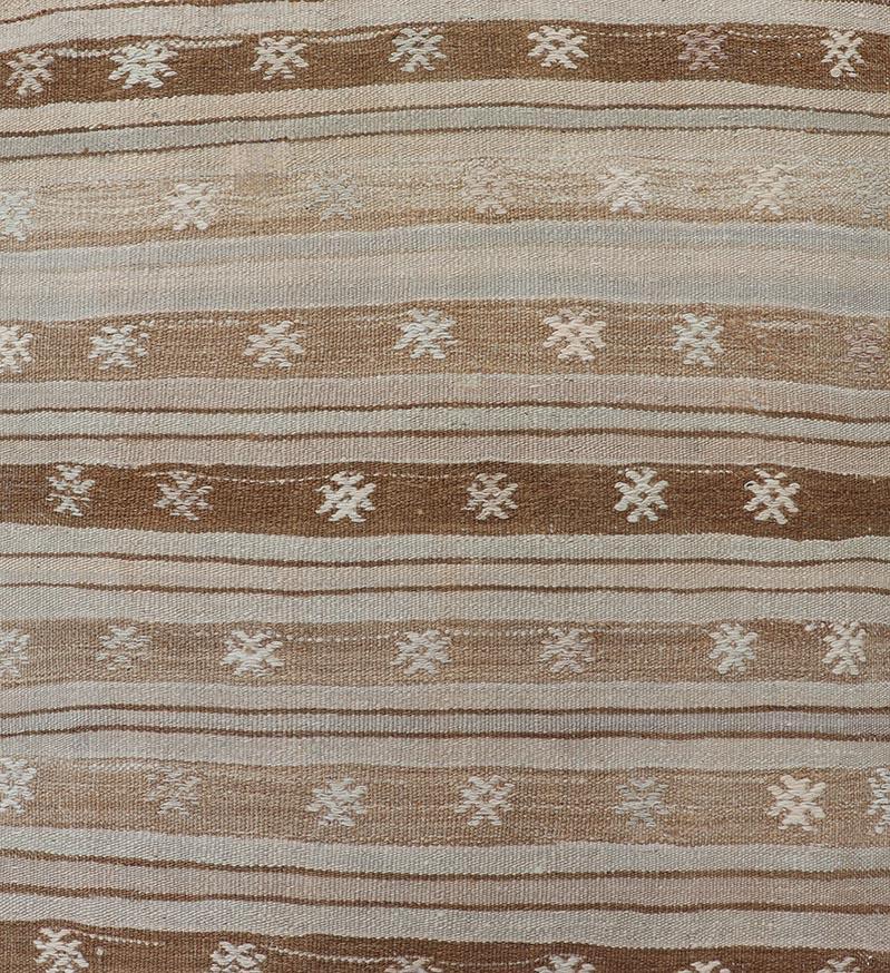 Wool Vintage Turkish Tribal Kilim Runner with Warm Neutrals and Intricate Geometric P For Sale