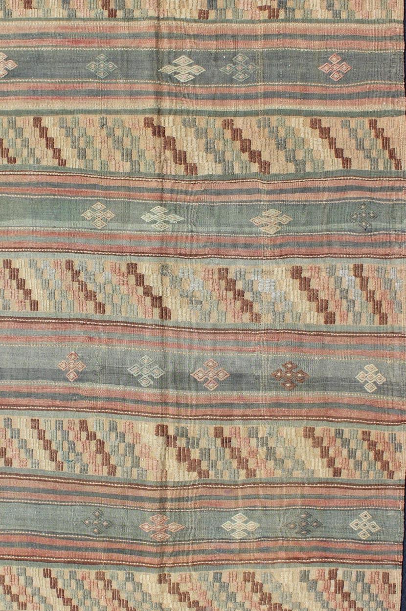 Wool Vintage Turkish Tribal Kilim with Striped Design in Earthy Tones For Sale