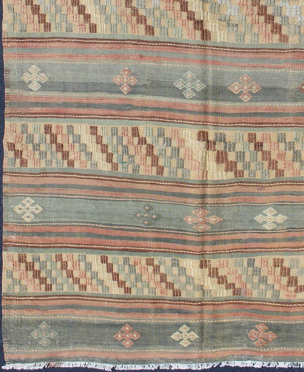 Vintage Turkish Tribal Kilim with Striped Design in Earthy Tones For Sale 1