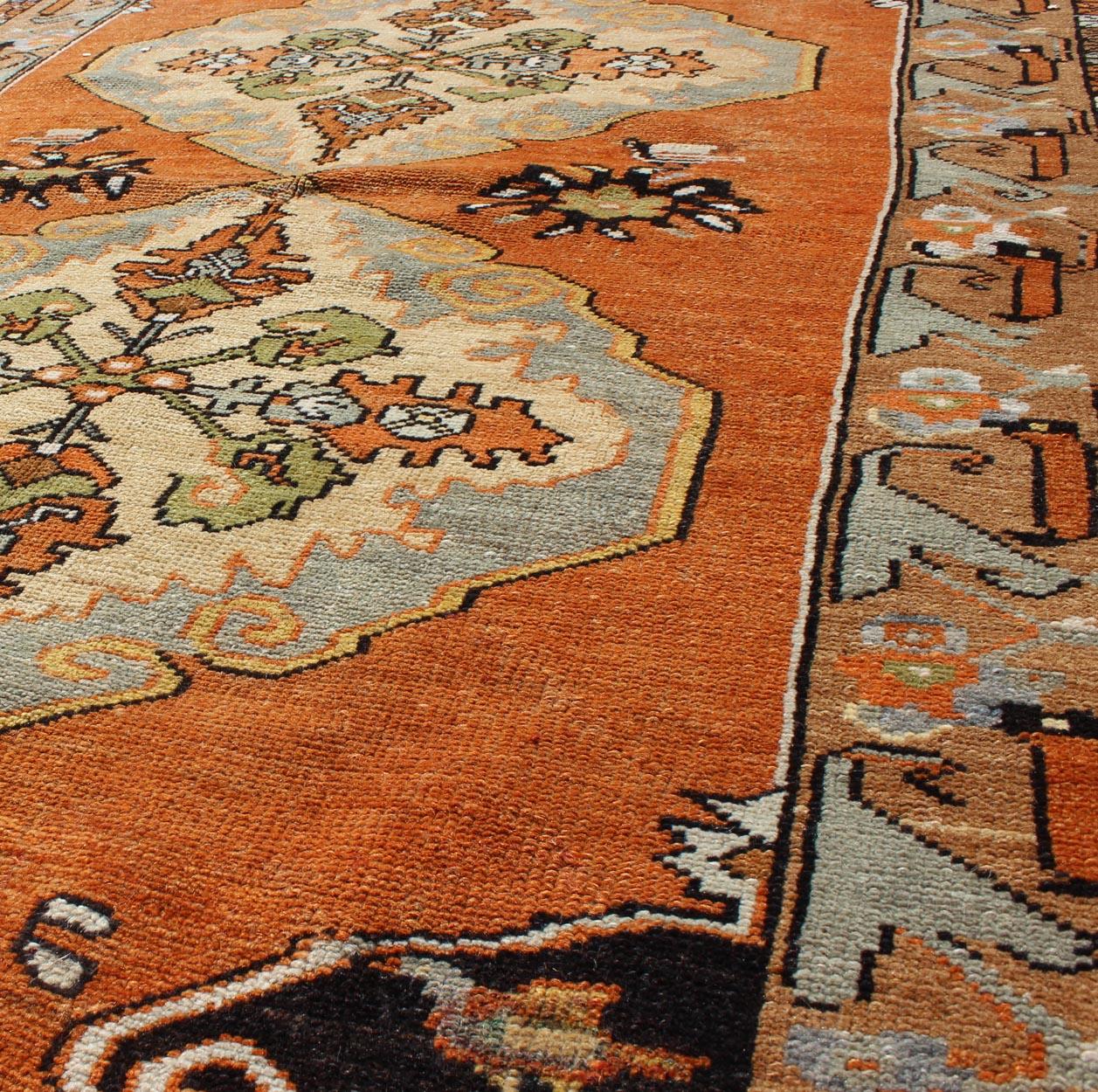 Hand-Knotted Vintage Turkish Tribal Medallion Area Rug in Orange, Green, Brown, and Blue For Sale