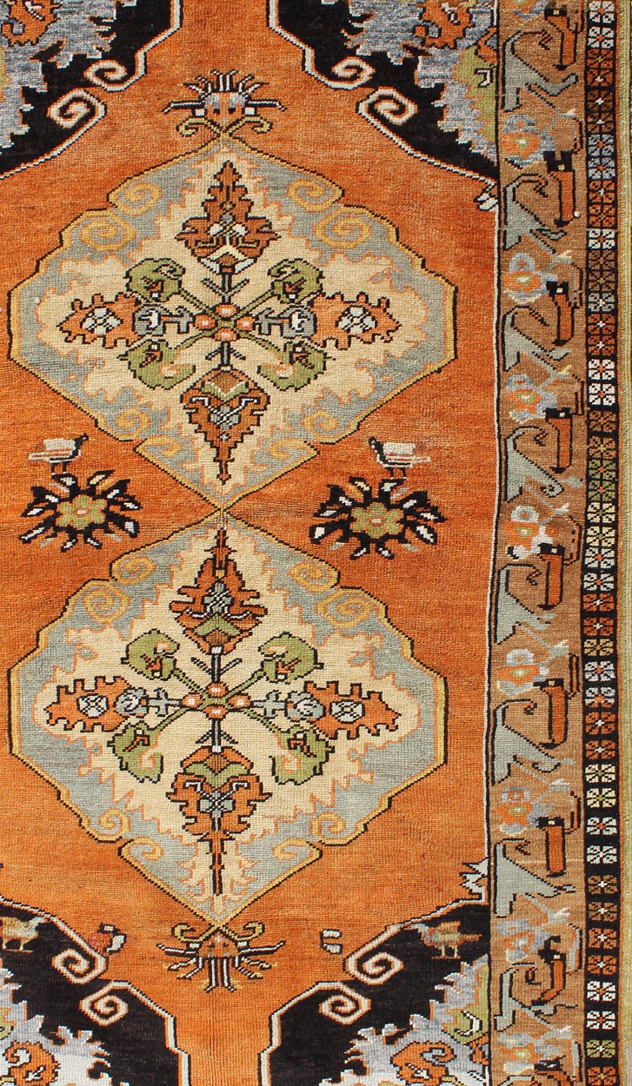 Vintage Turkish Tribal Medallion Area Rug in Orange, Green, Brown, and Blue In Good Condition For Sale In Atlanta, GA