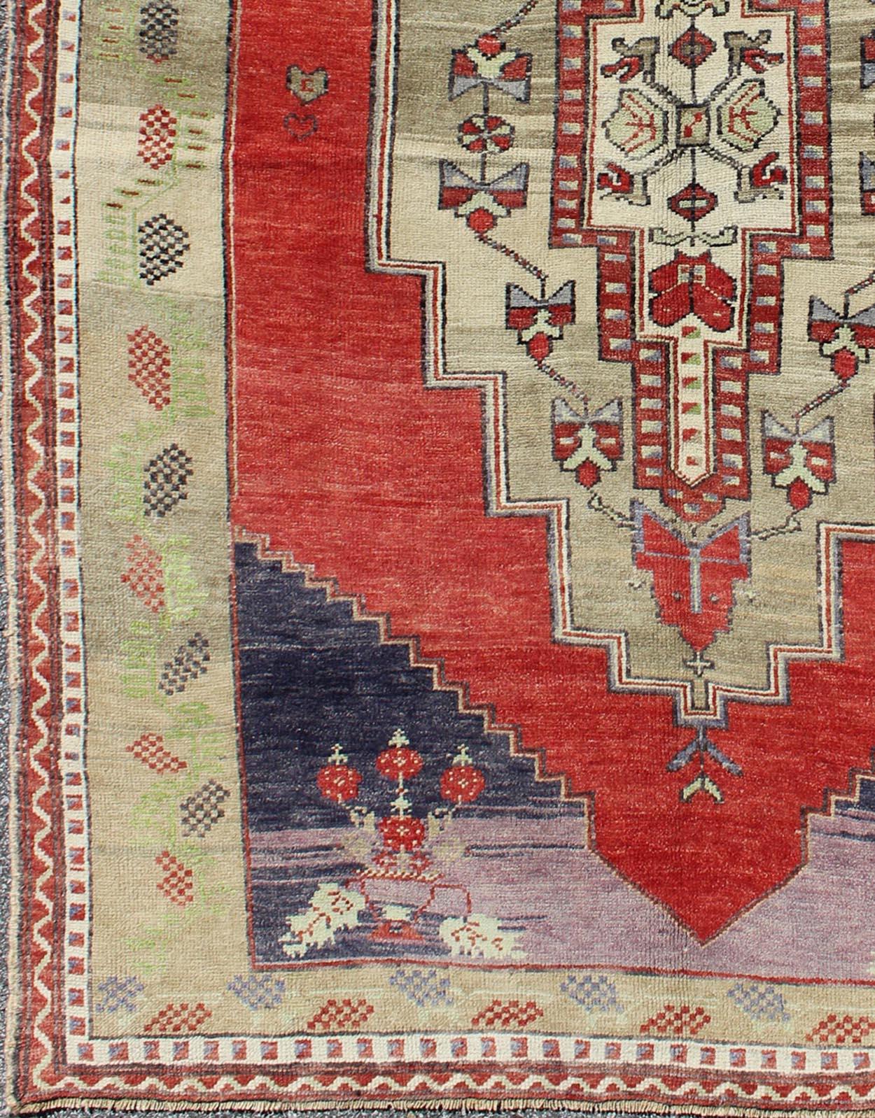 Hand-Knotted  Vintage Turkish Tribal Medallion Oushak in Red, Champagne, Lilac and Navy Blue For Sale
