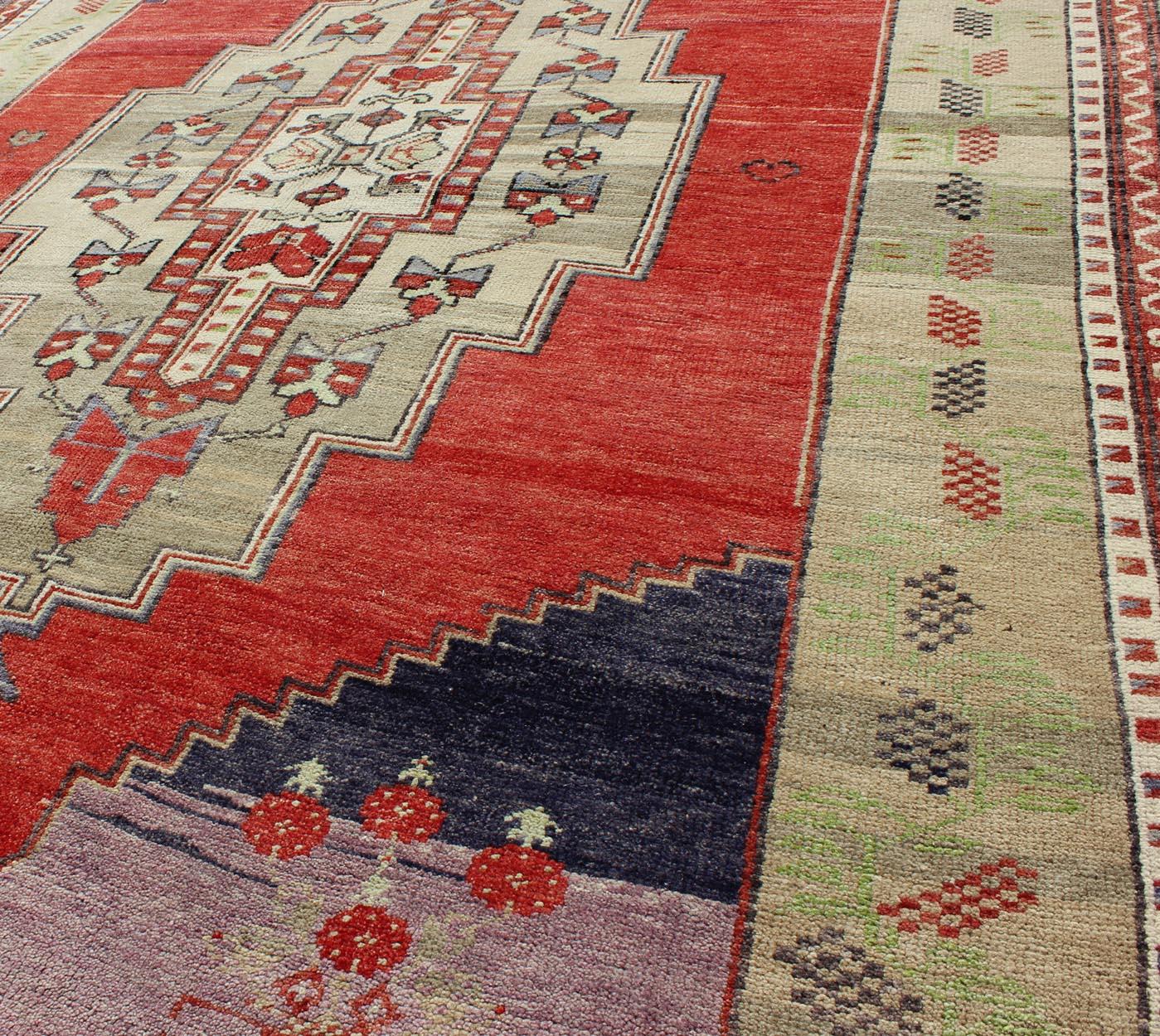 Wool  Vintage Turkish Tribal Medallion Oushak in Red, Champagne, Lilac and Navy Blue For Sale