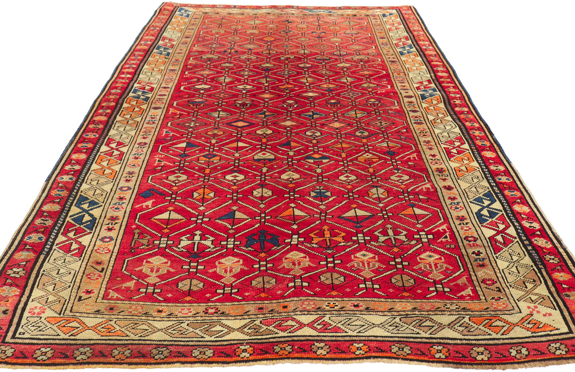 Hand-Knotted Vintage Turkish Tribal Oushak Rug with Vibrant Earth-Tone Colors For Sale