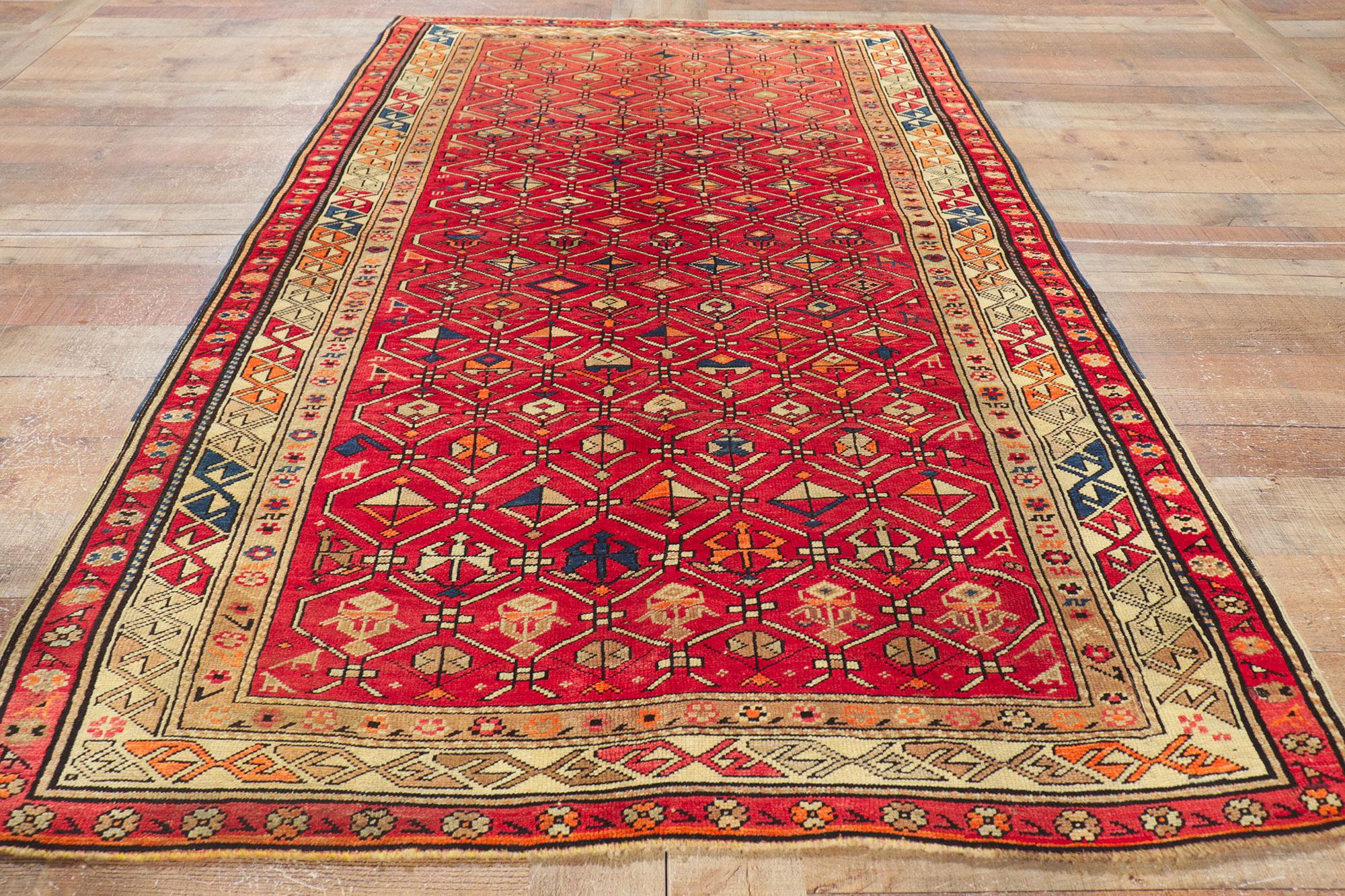 Vintage Turkish Tribal Oushak Rug with Vibrant Earth-Tone Colors For Sale 2