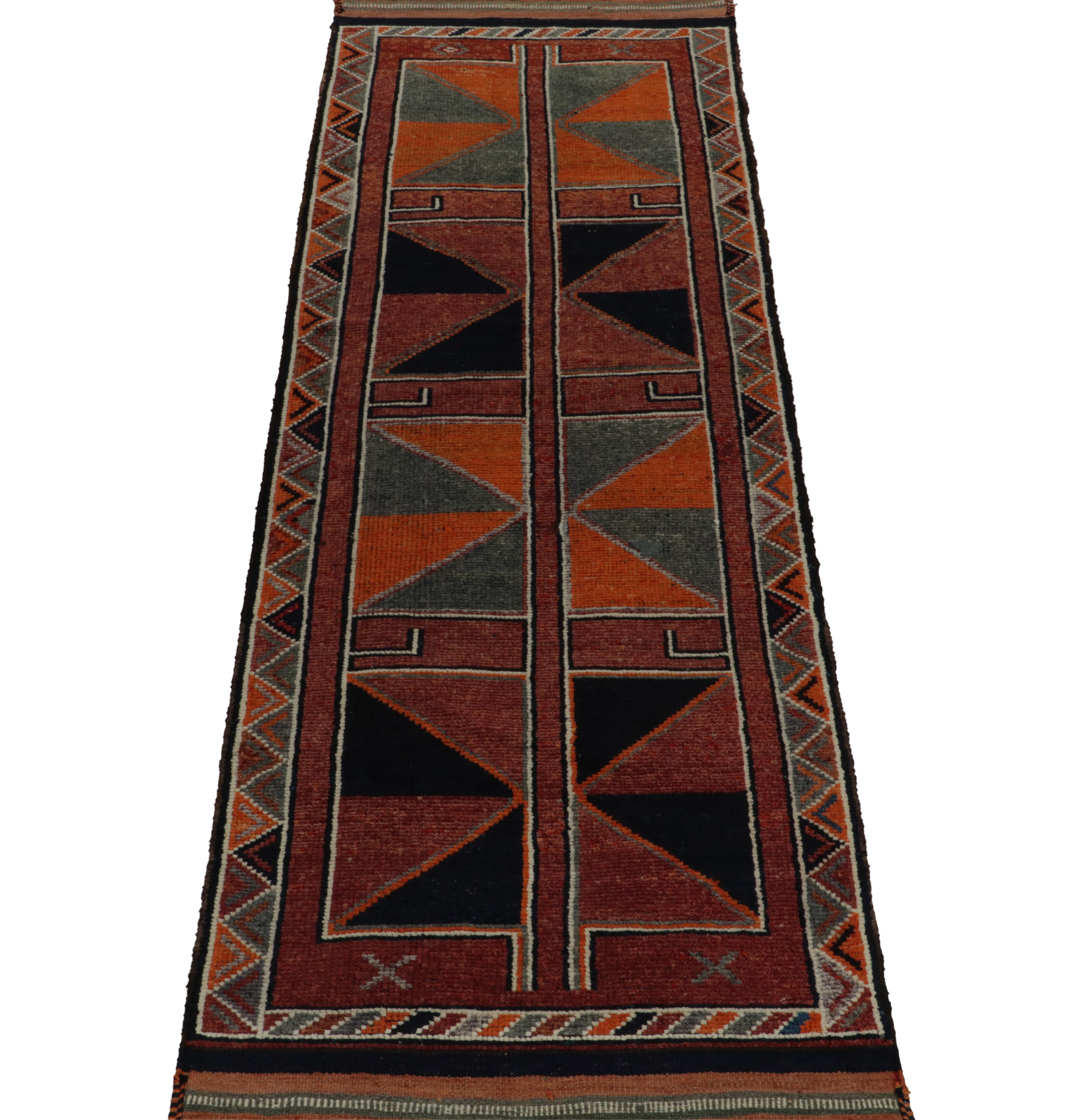 Hand-Knotted Vintage Turkish Tribal Runner in Red, Orange Geometric Patterns by Rug & Kilim For Sale